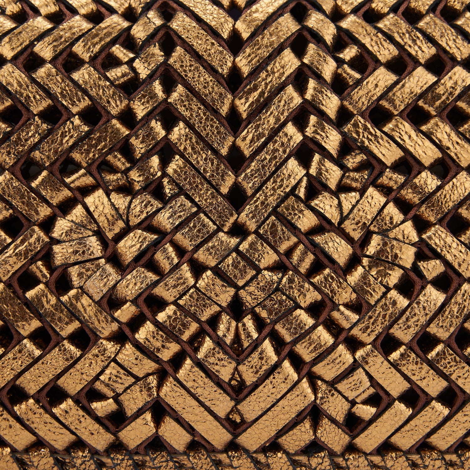 Neeson Tassel Clutch -

                  
                    Metallic Leather in Bronze -
                  

                  Anya Hindmarch US
