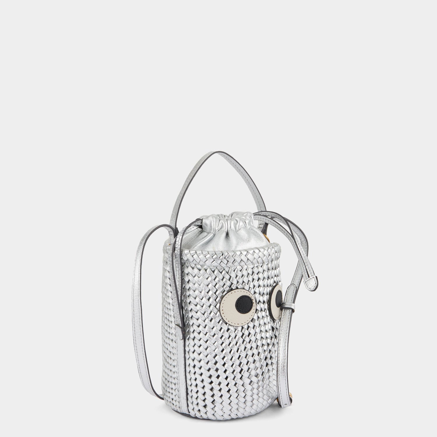 Plaited Mini Eyes Cross-body -

                  
                    Capra Leather in Silver -
                  

                  Anya Hindmarch US
