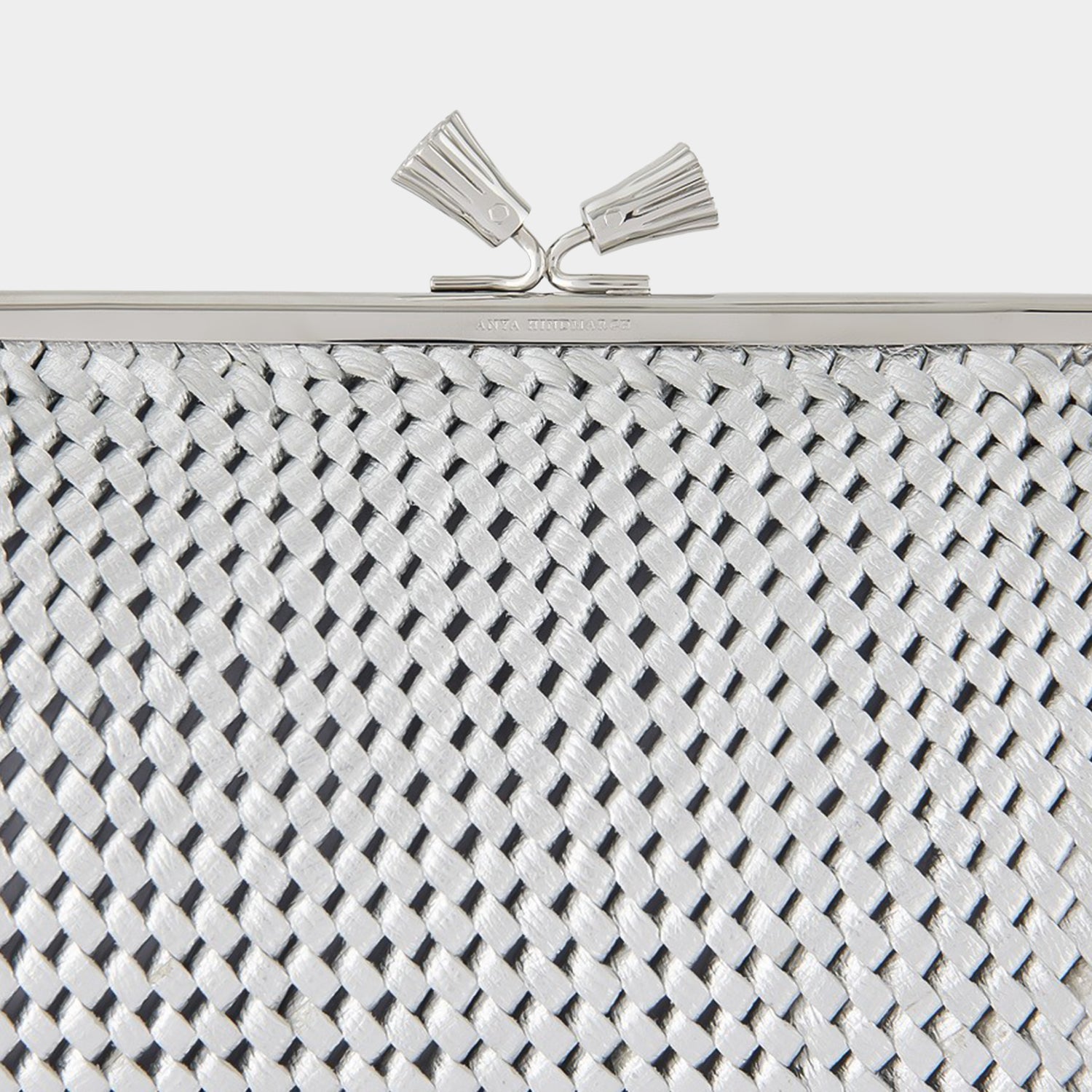 Large Maud Plaited Clutch -

                  
                    Capra Leather in Silver -
                  

                  Anya Hindmarch US
