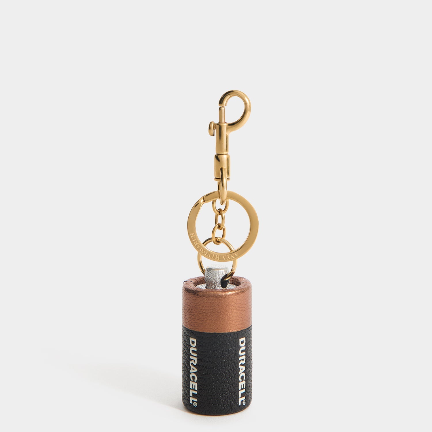 Anya Brands Duracell Charm -

          
            Capra Leather in Black -
          

          Anya Hindmarch US
