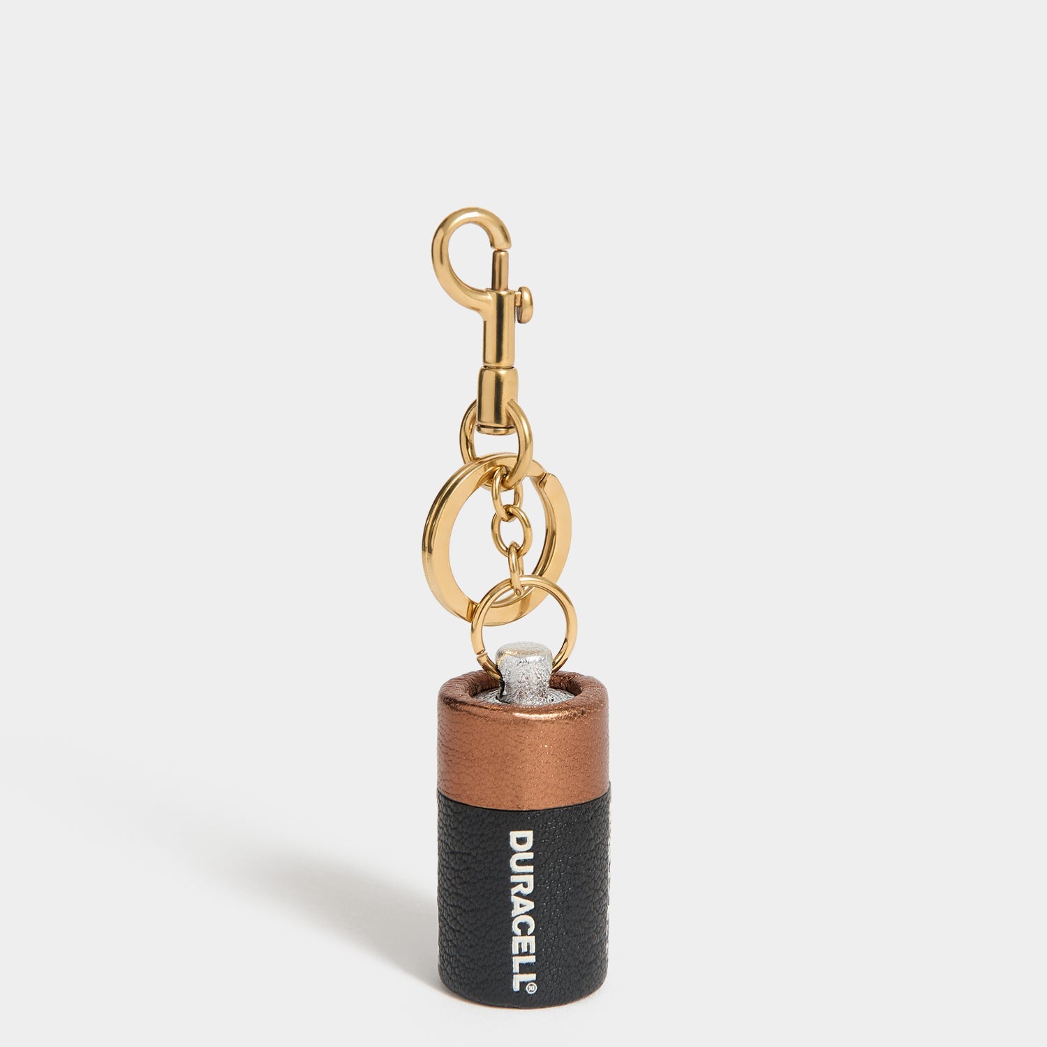 Anya Brands Duracell Charm -

          
            Capra Leather in Black -
          

          Anya Hindmarch US
