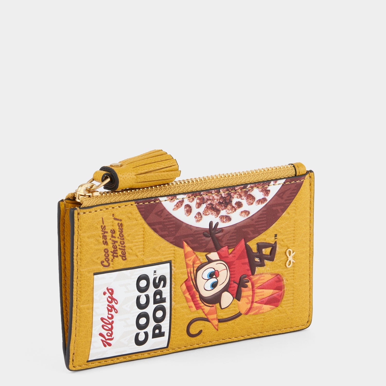 Anya Brands Coco Pops Zip Card Case -

                  
                    Capra Leather in Mustard -
                  

                  Anya Hindmarch US
