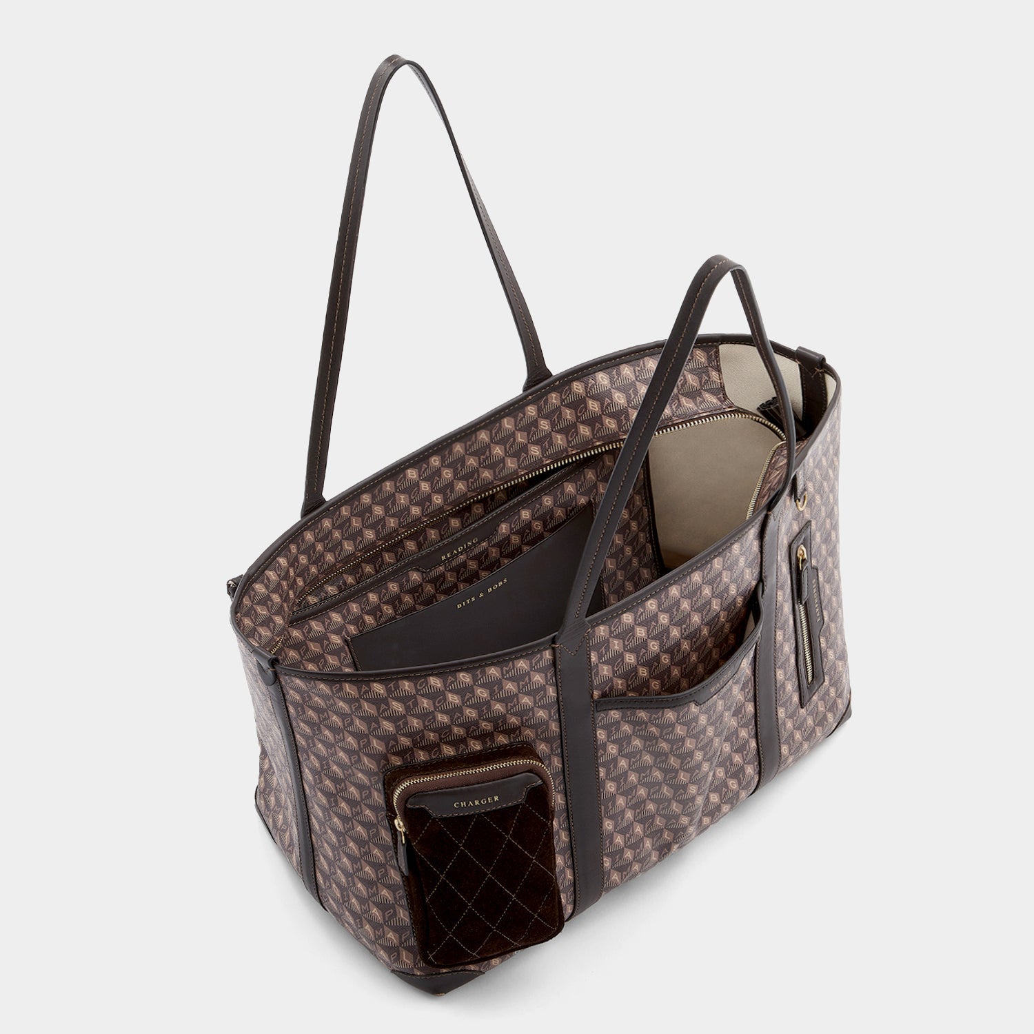 I Am A Plastic Bag In-Flight Tote -

          
            Recycled Canvas in Truffle -
          

          Anya Hindmarch US
