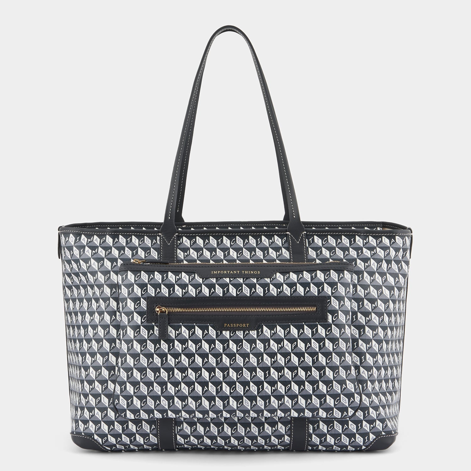 I am a Plastic Bag In-Flight Tote -

                  
                    Recycled coated canvas in charcoal -
                  

                  Anya Hindmarch US
