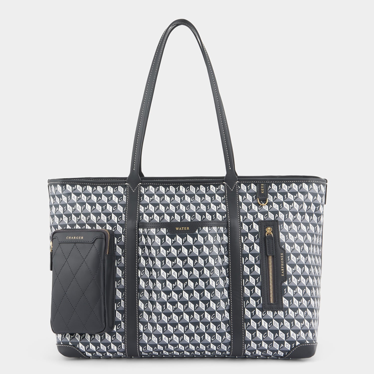 I am a Plastic Bag In-Flight Tote -

                  
                    Recycled coated canvas in charcoal -
                  

                  Anya Hindmarch US
