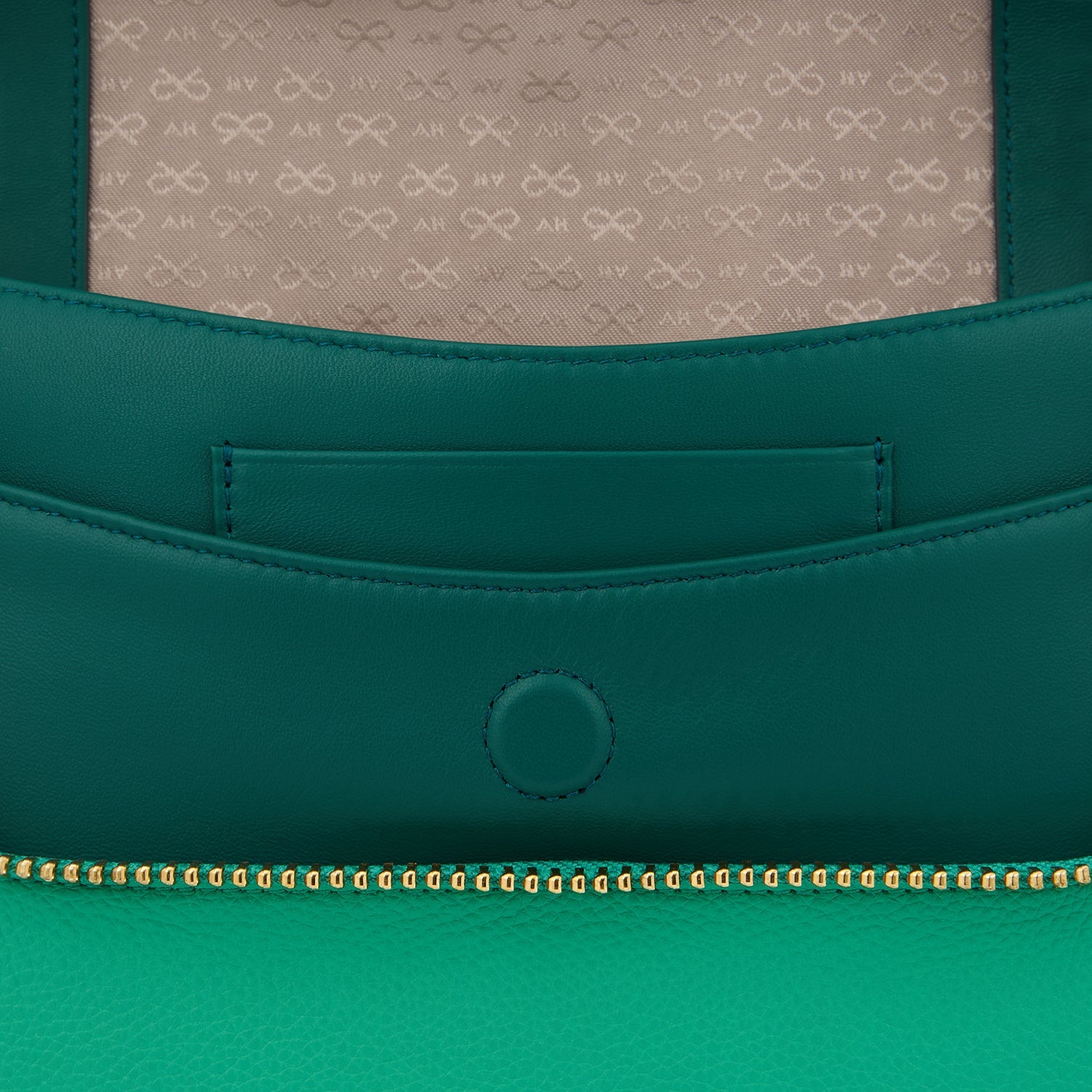 Maxi Zip Cross-body -

                  
                    Soft Leather in Arsenic -
                  

                  Anya Hindmarch US
