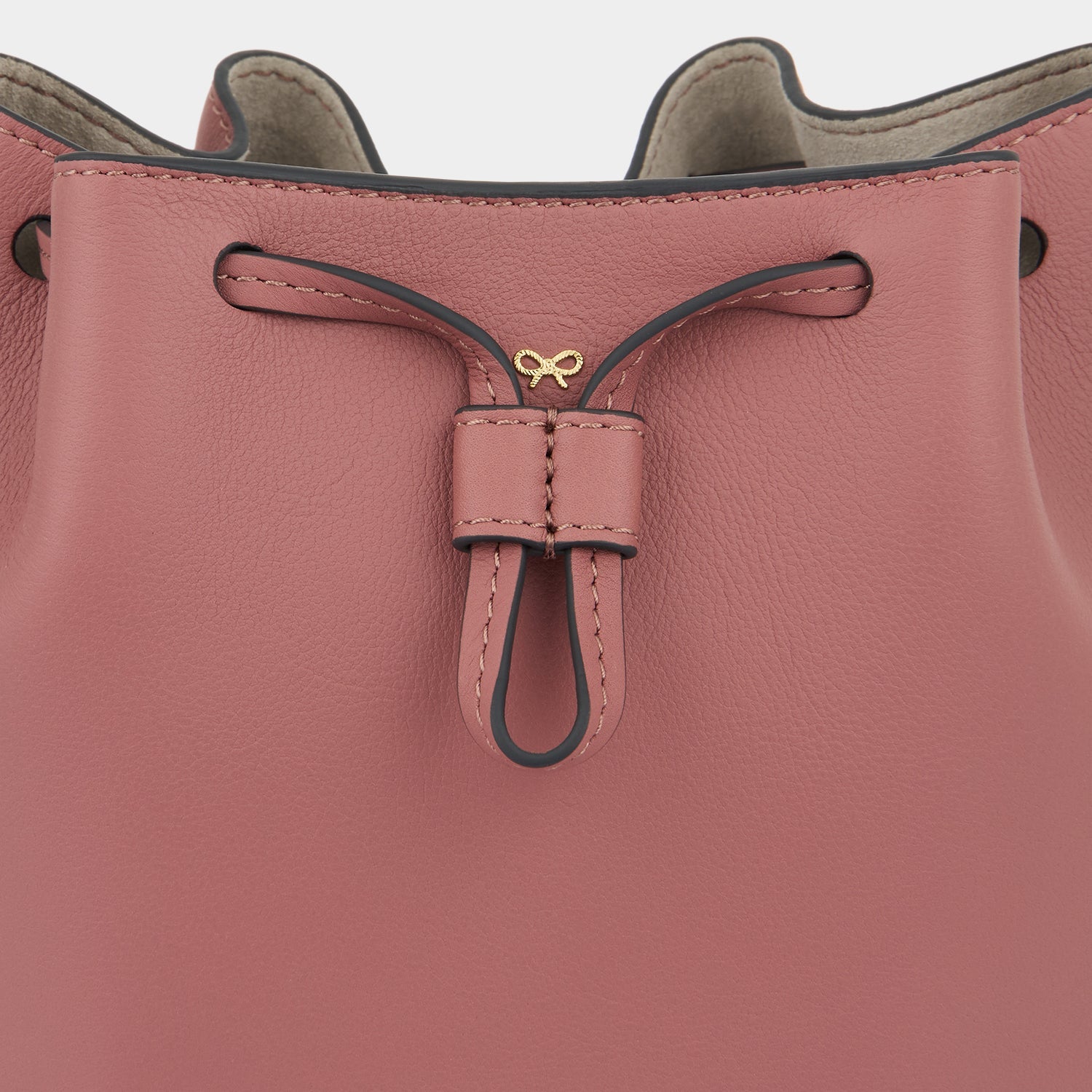 Vaughan Drawstring -

                  
                    Leather in Blush -
                  

                  Anya Hindmarch US
