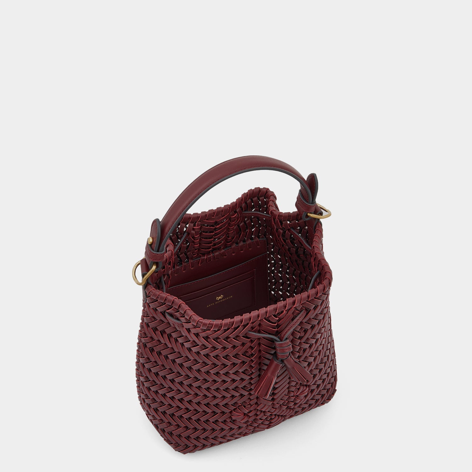 Neeson Small Drawstring -

                  
                    Calf Leather in Medium Red -
                  

                  Anya Hindmarch US
