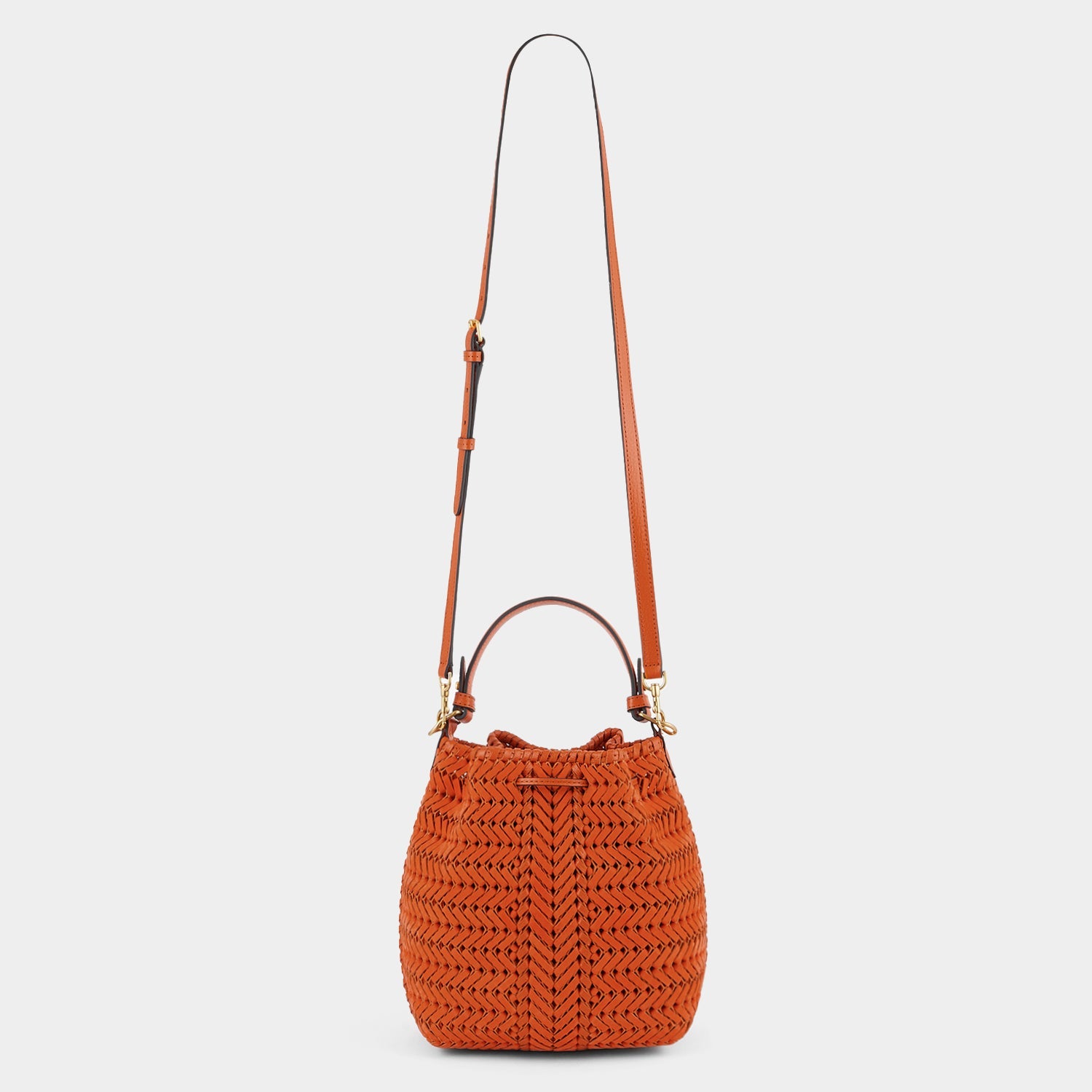 Neeson Small Drawstring -

                  
                    Nubuck Leather in Clementine -
                  

                  Anya Hindmarch US
