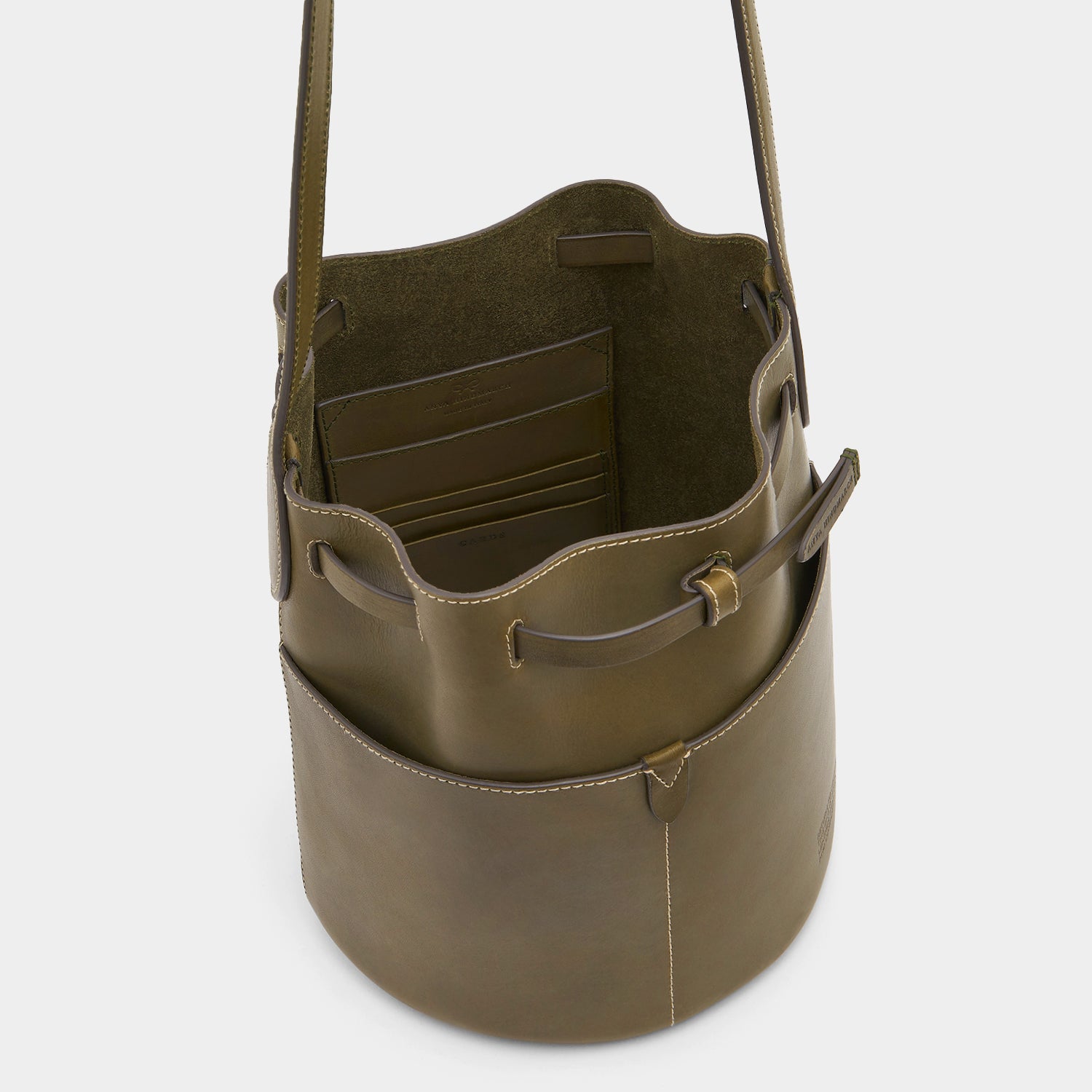 Return to Nature Small Bucket Bag -

                  
                    Compostable Leather in Fern -
                  

                  Anya Hindmarch US

