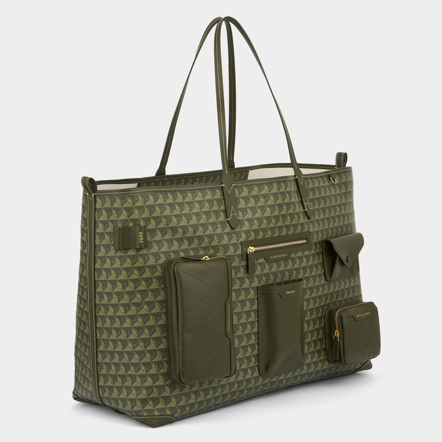 I Am A Plastic Bag XL Multi Pocket Tote -

                  
                    Recycled Canvas in Fern -
                  

                  Anya Hindmarch US
