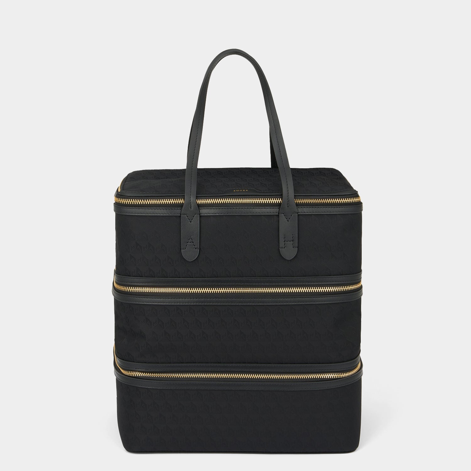 Logo Shoe Stack -

                  
                    Recycled Nylon in Black -
                  

                  Anya Hindmarch US

