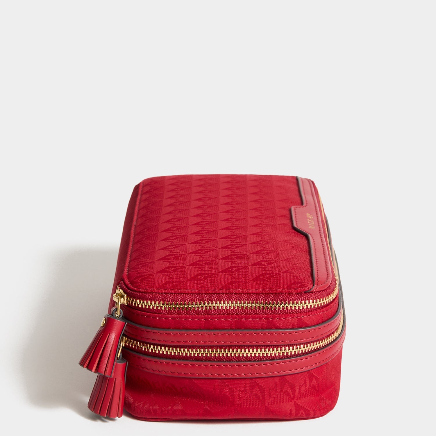Logo Make-Up Pouch -

          
            Jacquard Nylon Up in Red -
          

          Anya Hindmarch US
