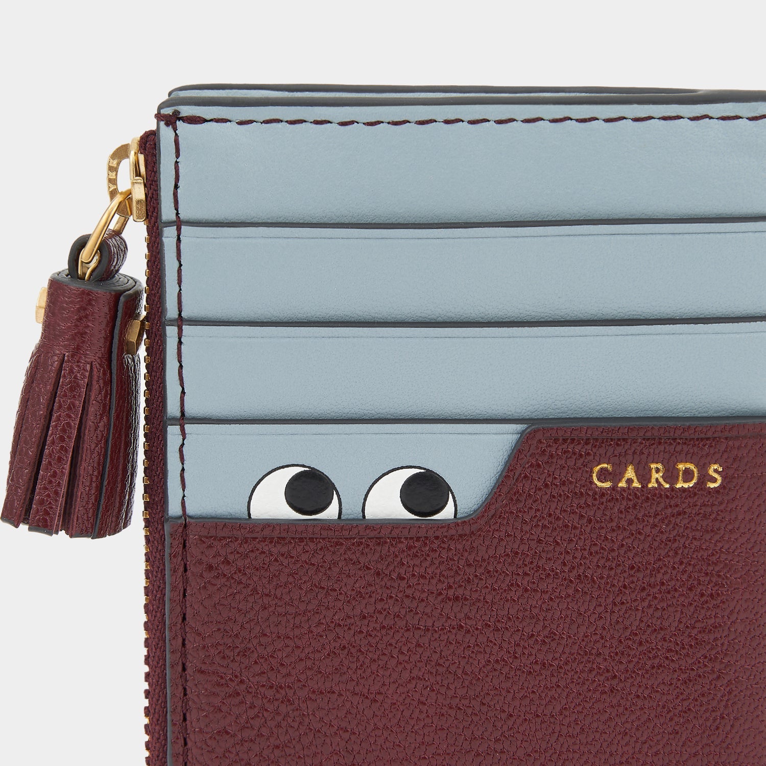 Peeping Eyes Zip Card Case -

                  
                    Capra Leather in Rosewood -
                  

                  Anya Hindmarch US
