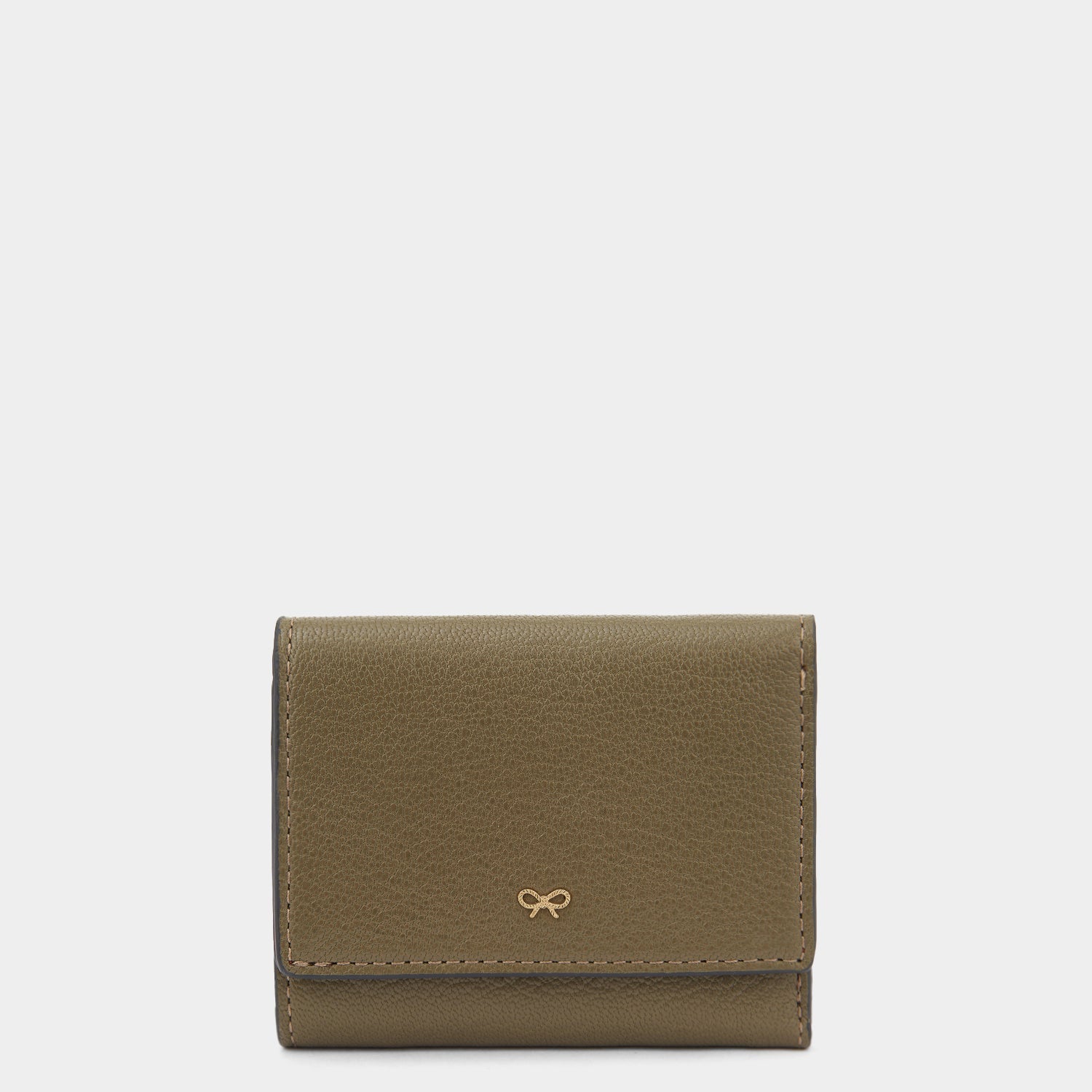 Zany Mini Trifold -

                  
                    Capra Leather in Fern -
                  

                  Anya Hindmarch US
