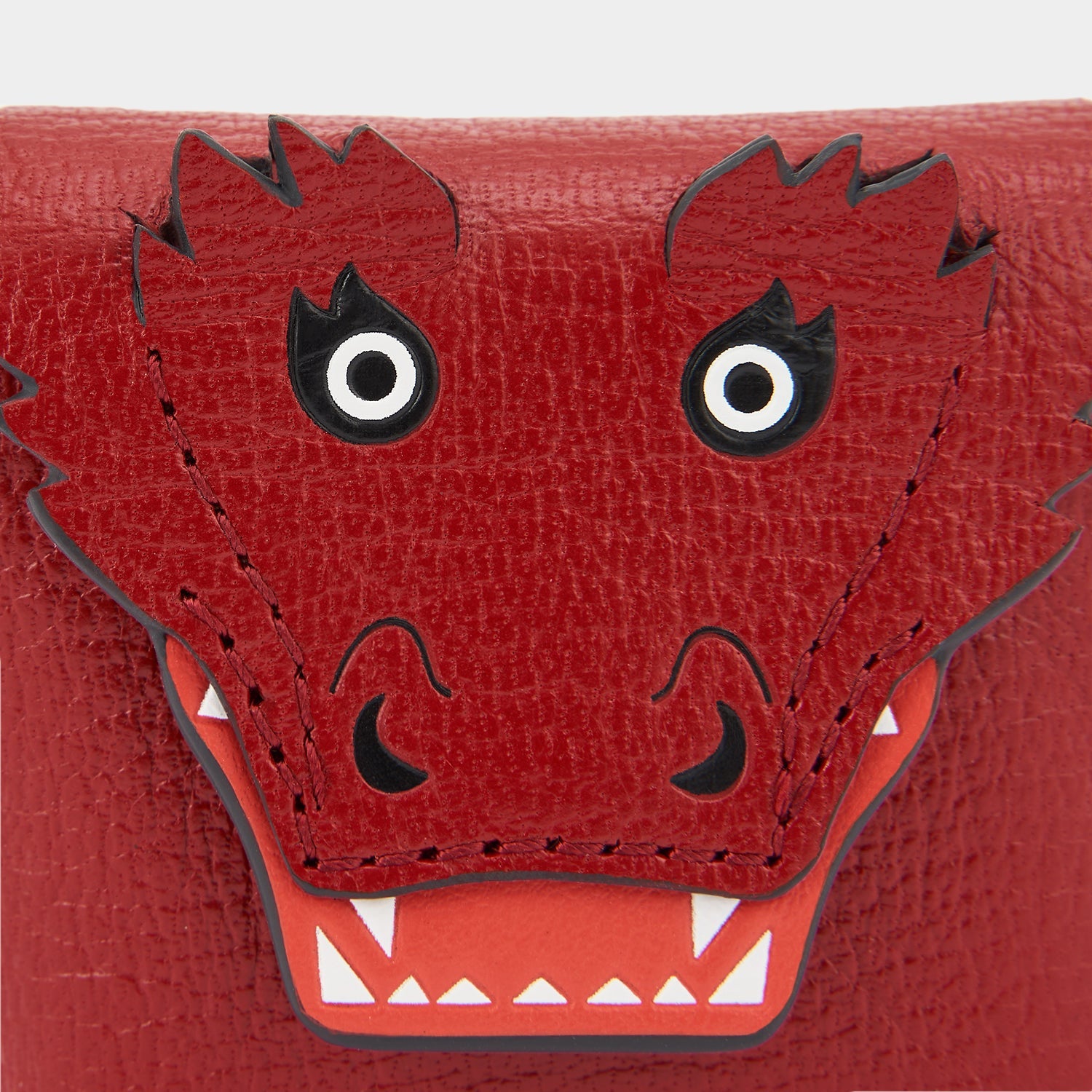 Dragon Earphones Pouch -

                  
                    Capra Leather in Russet -
                  

                  Anya Hindmarch US
