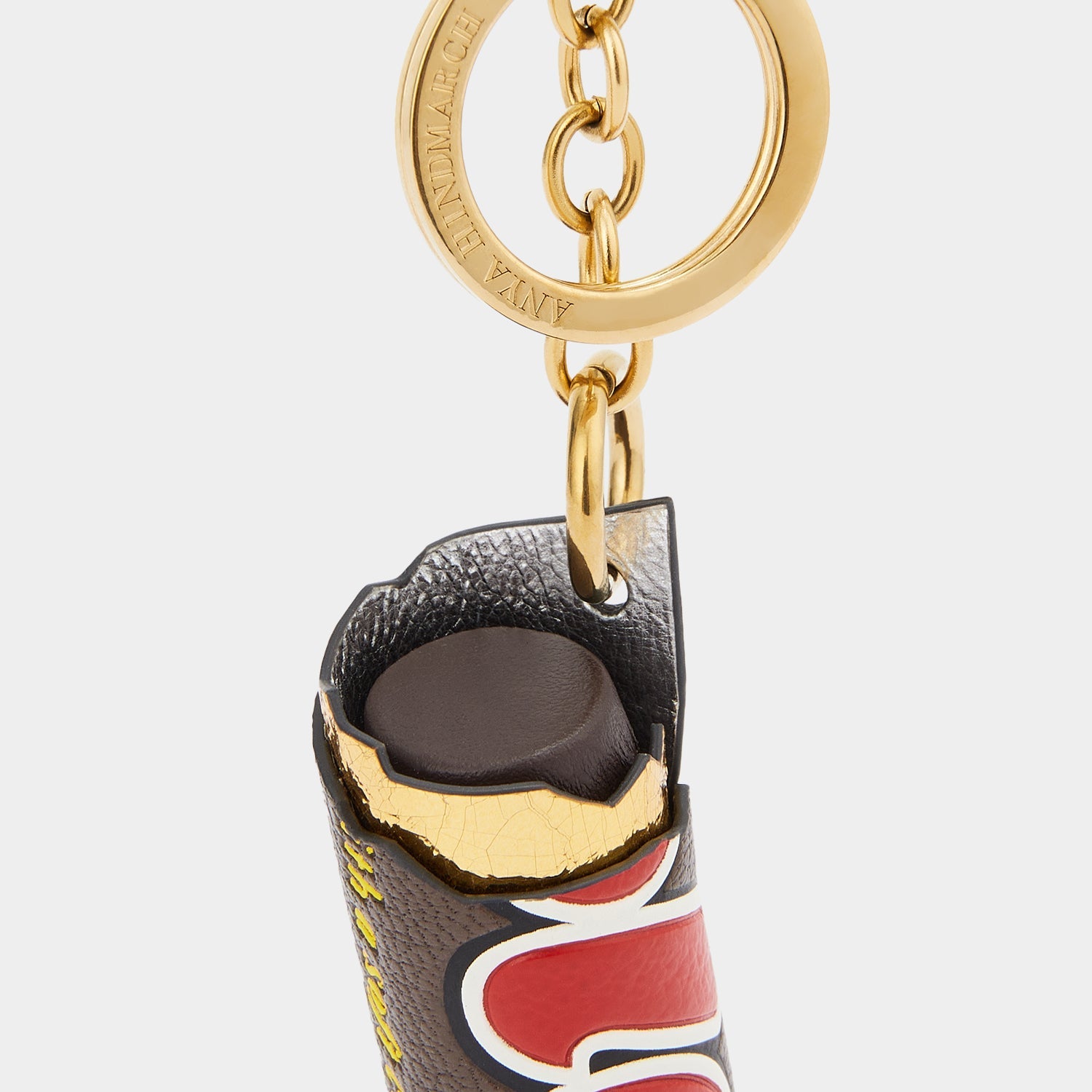 Anya Brands Rolo Charm -

                  
                    Capra Leather in Truffle -
                  

                  Anya Hindmarch US
