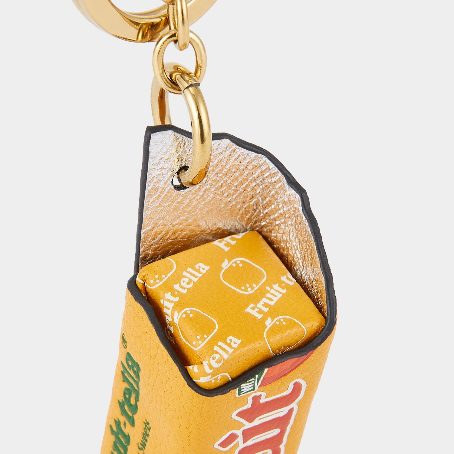 Anya Brands Fruittella Charm -

                  
                    Capra Leather in Honey -
                  

                  Anya Hindmarch US
