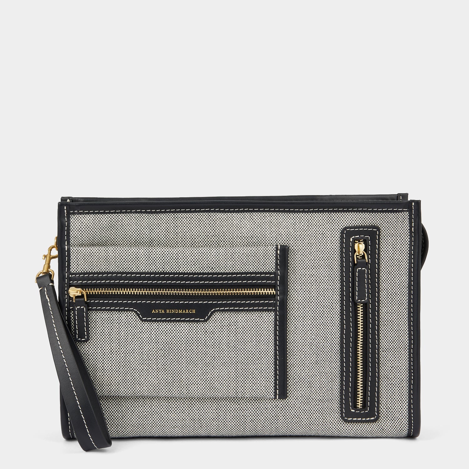 Pocket Pochette -

                  
                    Mixed Canvas in Salt and Pepper -
                  

                  Anya Hindmarch US
