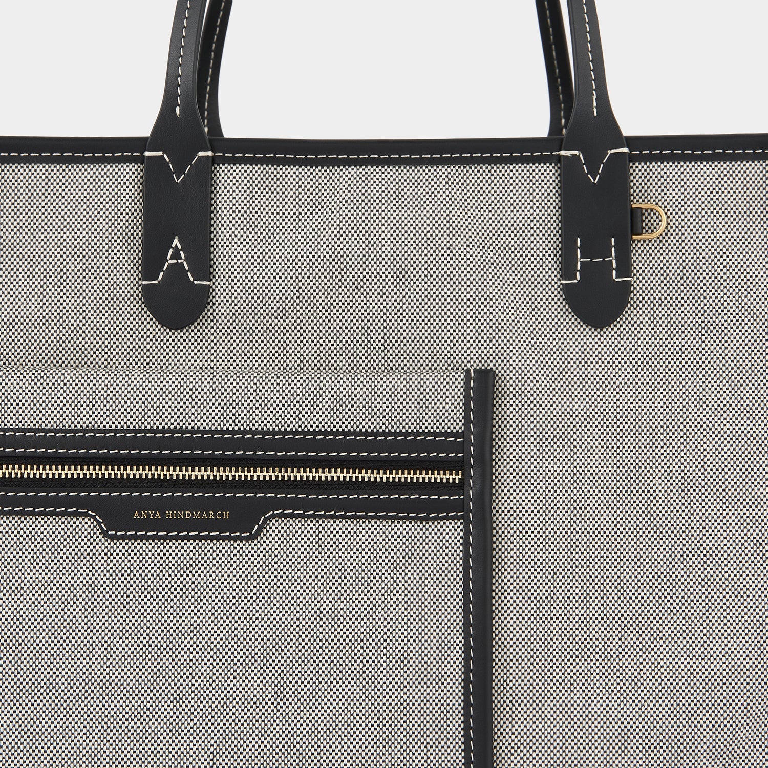 Pocket Tote -

                  
                    Mixed Canvas in Salt and Pepper -
                  

                  Anya Hindmarch US
