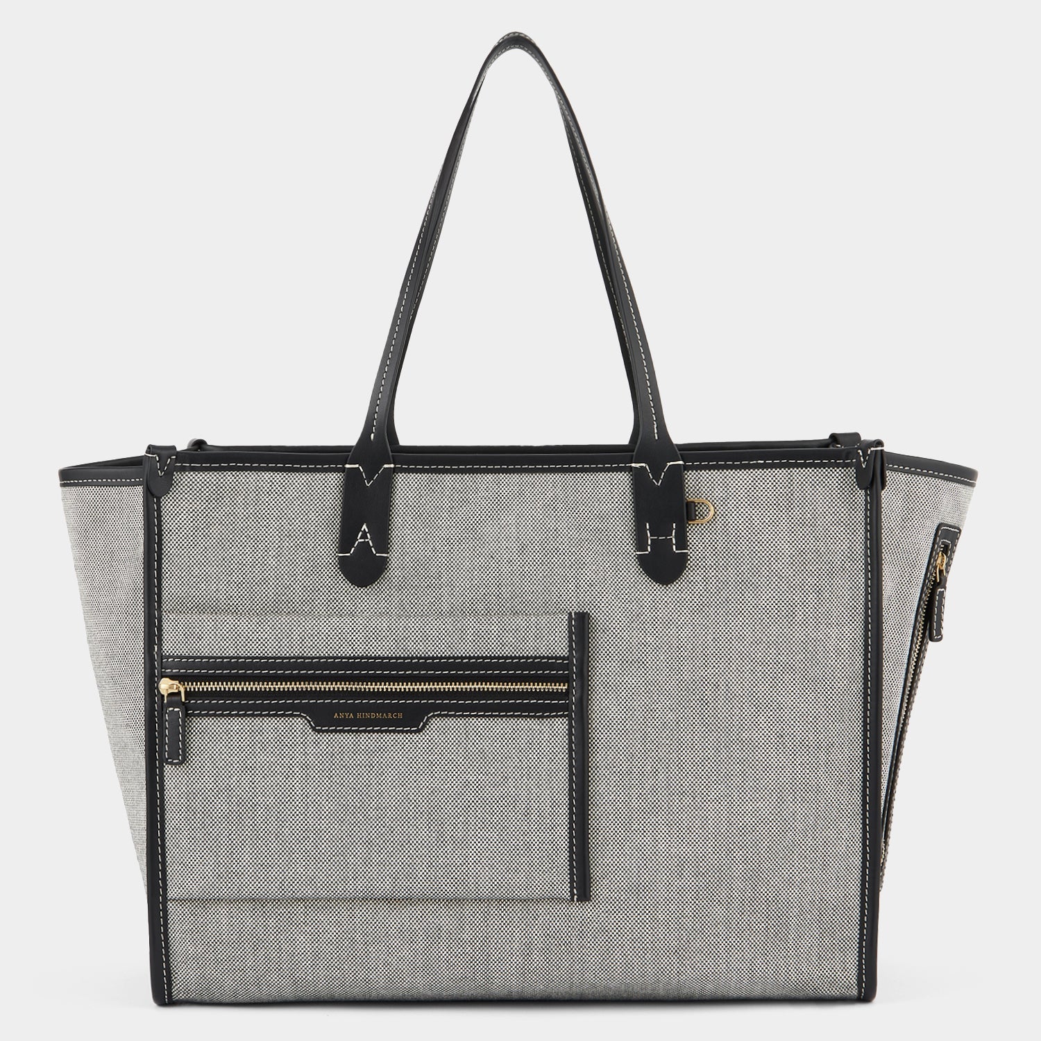Pocket Tote -

                  
                    Mixed Canvas in Salt and Pepper -
                  

                  Anya Hindmarch US
