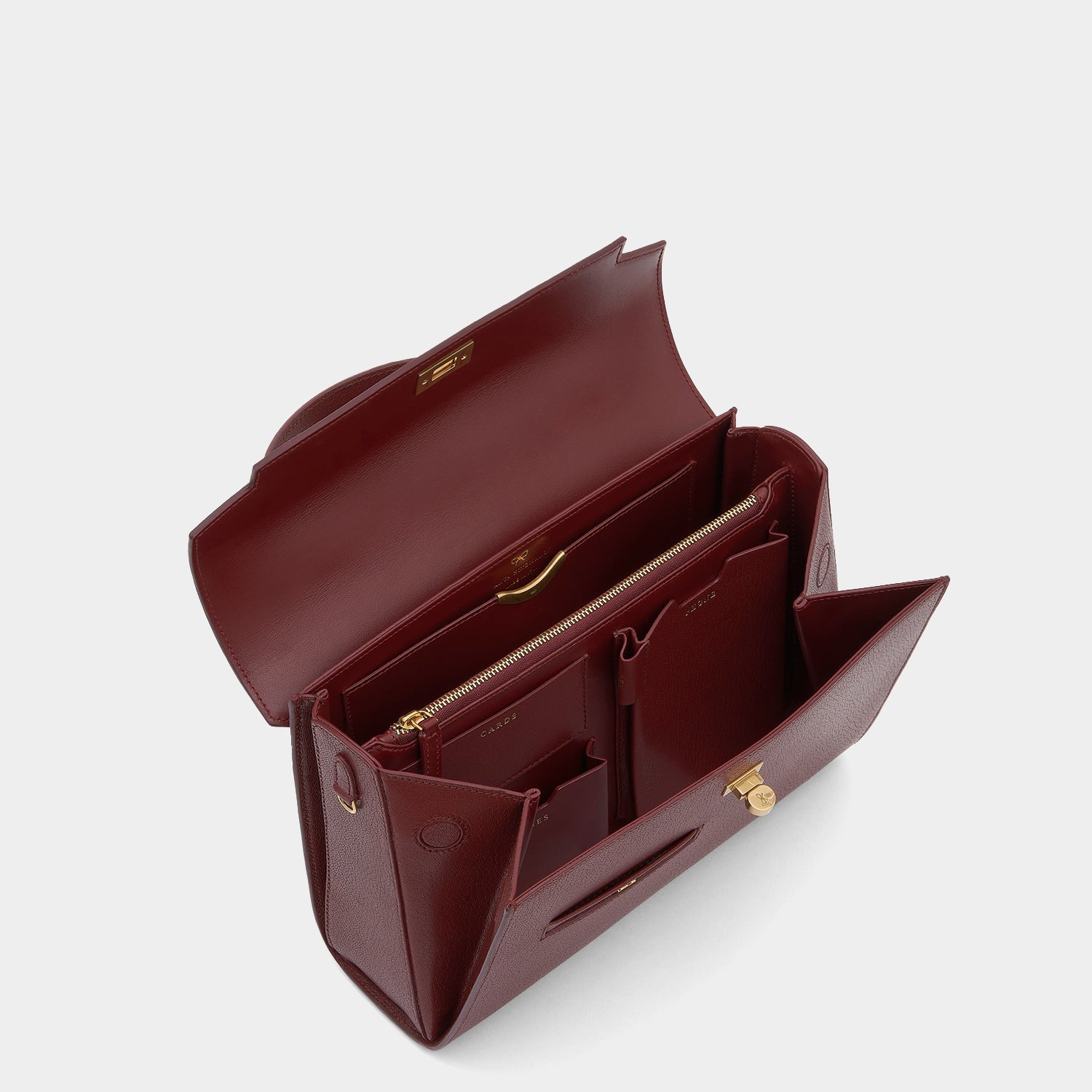 Mortimer -

                  
                    Leather in Rosewood -
                  

                  Anya Hindmarch US
