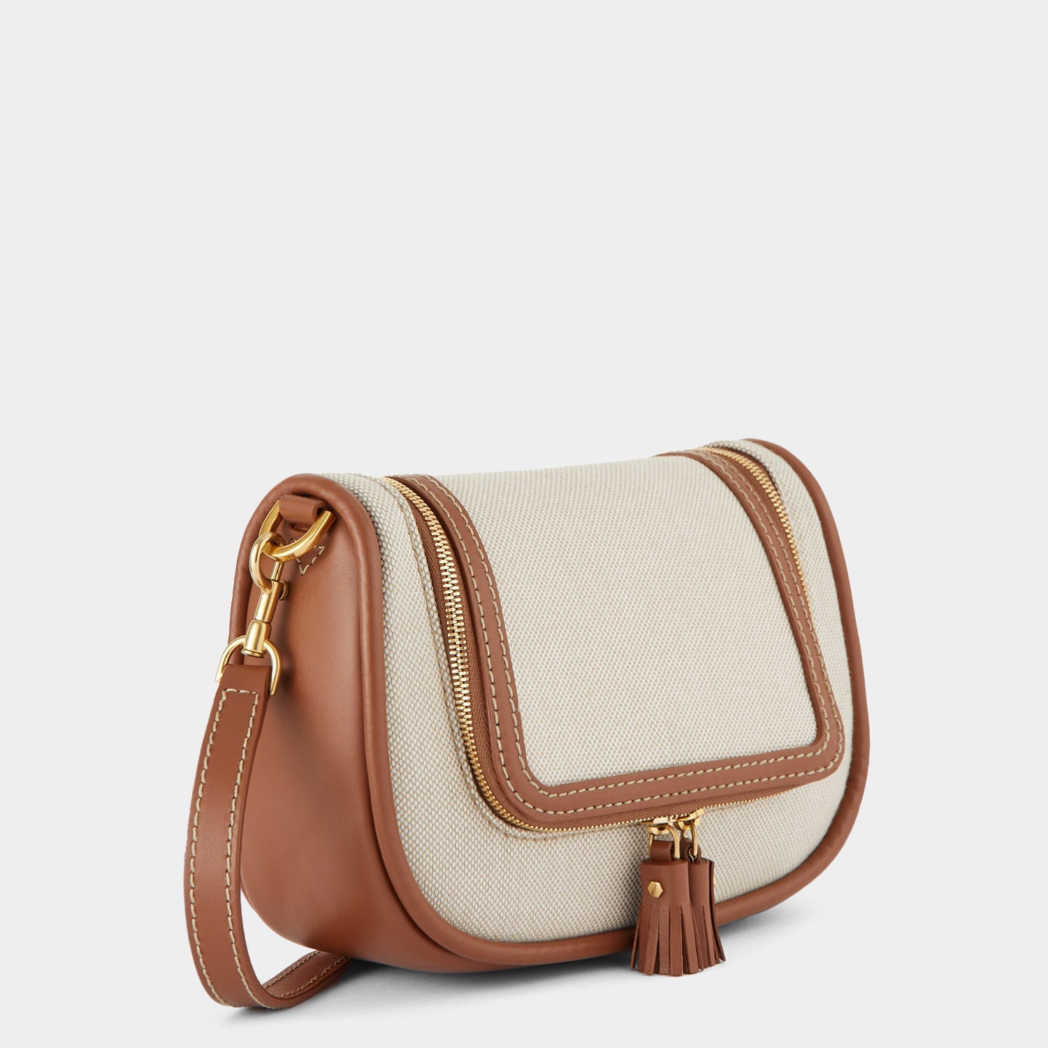 Vere Small Soft Satchel Cross-body -

                  
                    Mixed Canvas in Natural -
                  

                  Anya Hindmarch US
