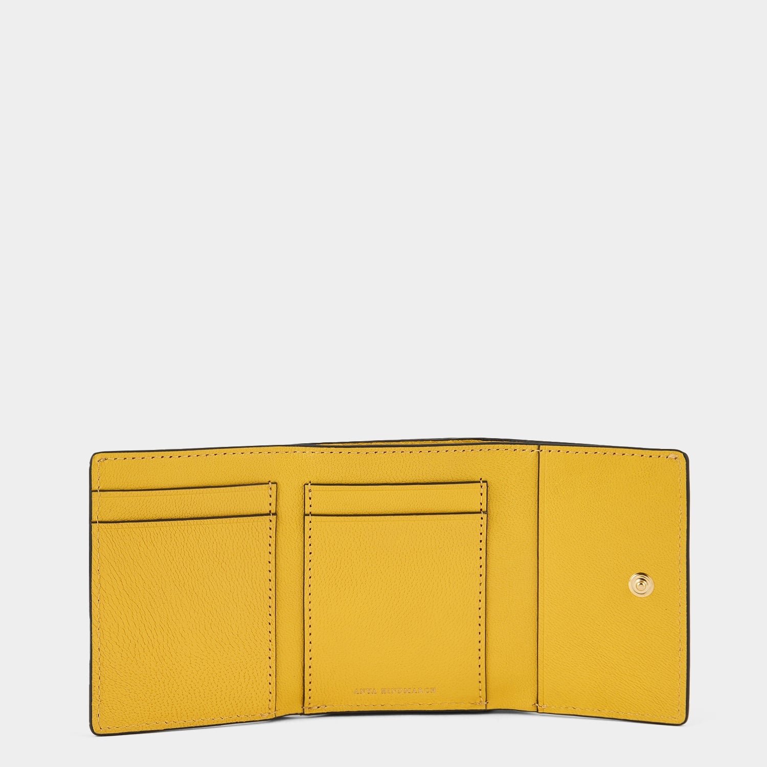 Kawaii Happy Mini Trifold -

                  
                    Capra Leather in Yellow Jade -
                  

                  Anya Hindmarch US
