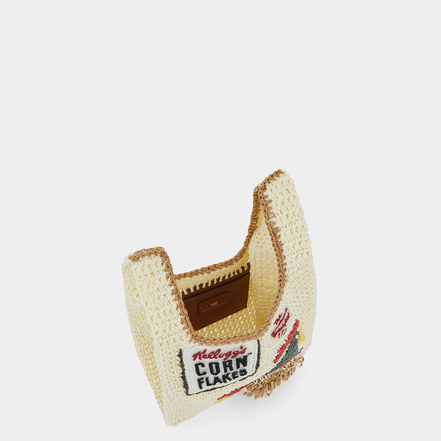 Anya Brands Corn Flakes Raffia Mini Tote -

                  
                    Paper Raffia in Chalk -
                  

                  Anya Hindmarch US
