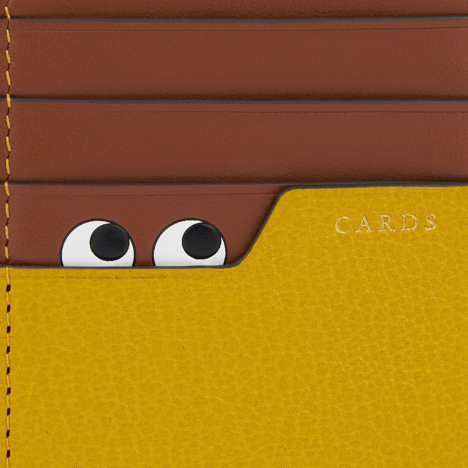 Peeping Eyes Zip Card Case -

                  
                    Capra Leather in Mustard -
                  

                  Anya Hindmarch US
