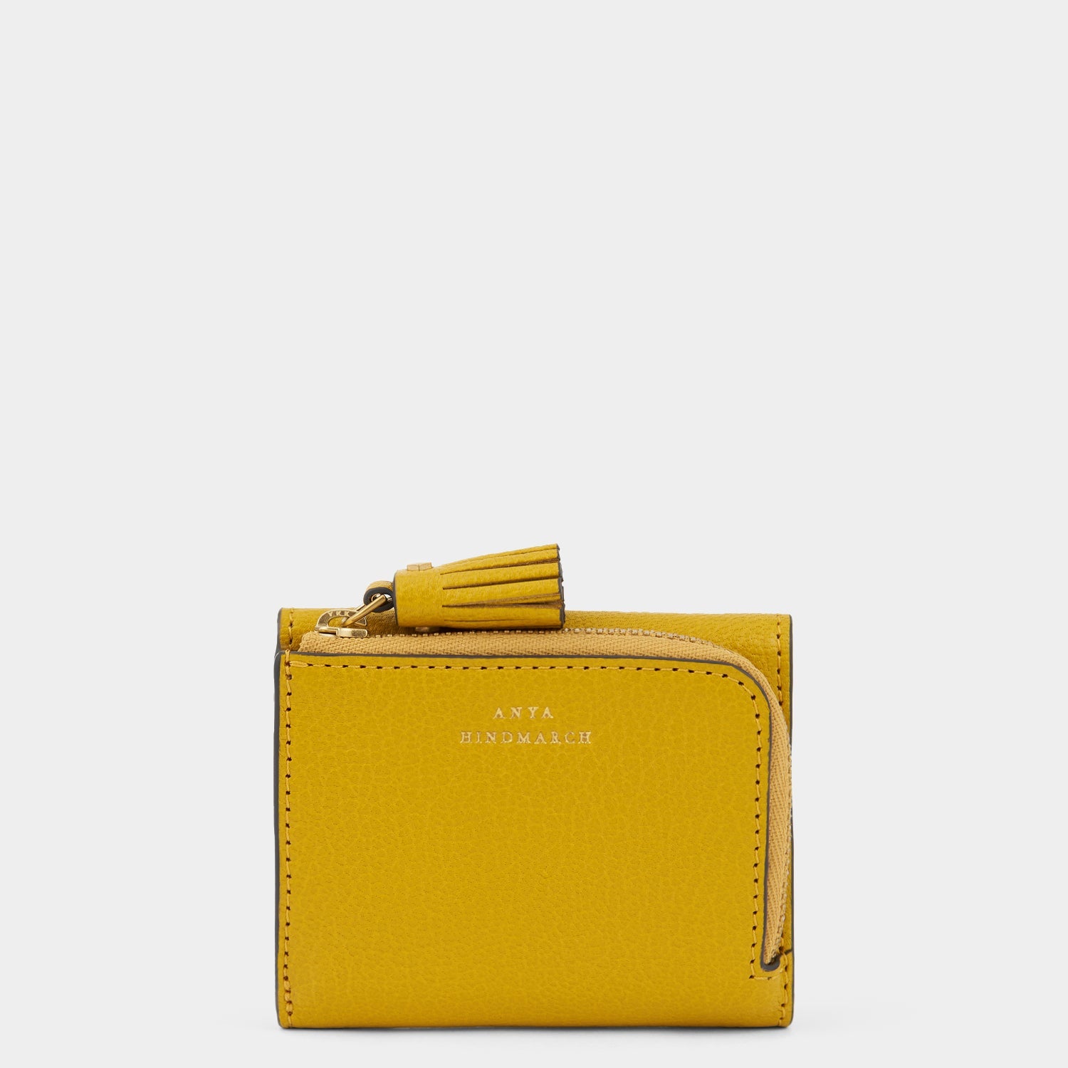 Peeping Eyes Mini Trifold Zip Wallet -

                  
                    Capra Leather in Mustard -
                  

                  Anya Hindmarch US
