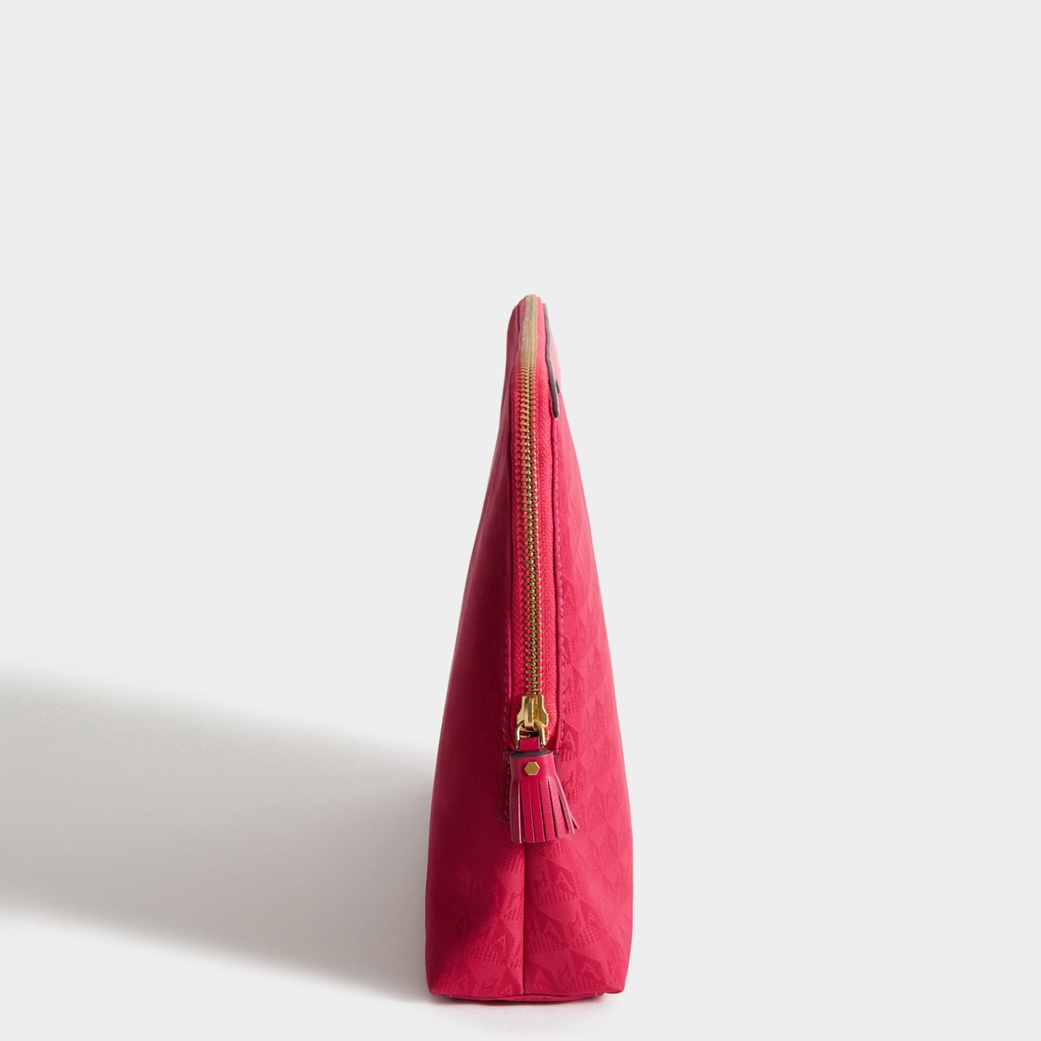 Logo Lotions and Potions Pouch -

          
            Jacquard Nylon Potions in Magenta -
          

          Anya Hindmarch US

