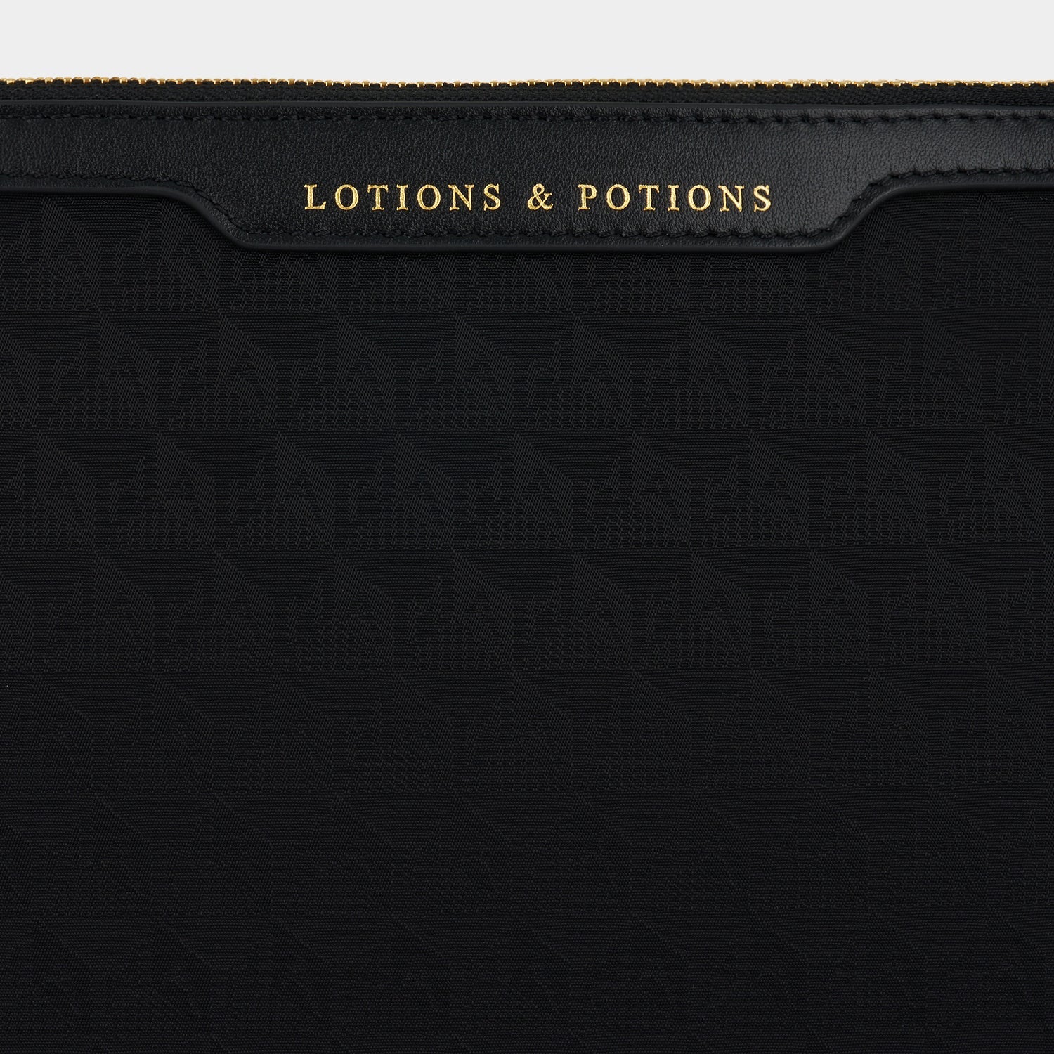 Logo Lotions and Potions Pouch -

                  
                    Recycled Nylon in Black -
                  

                  Anya Hindmarch US
