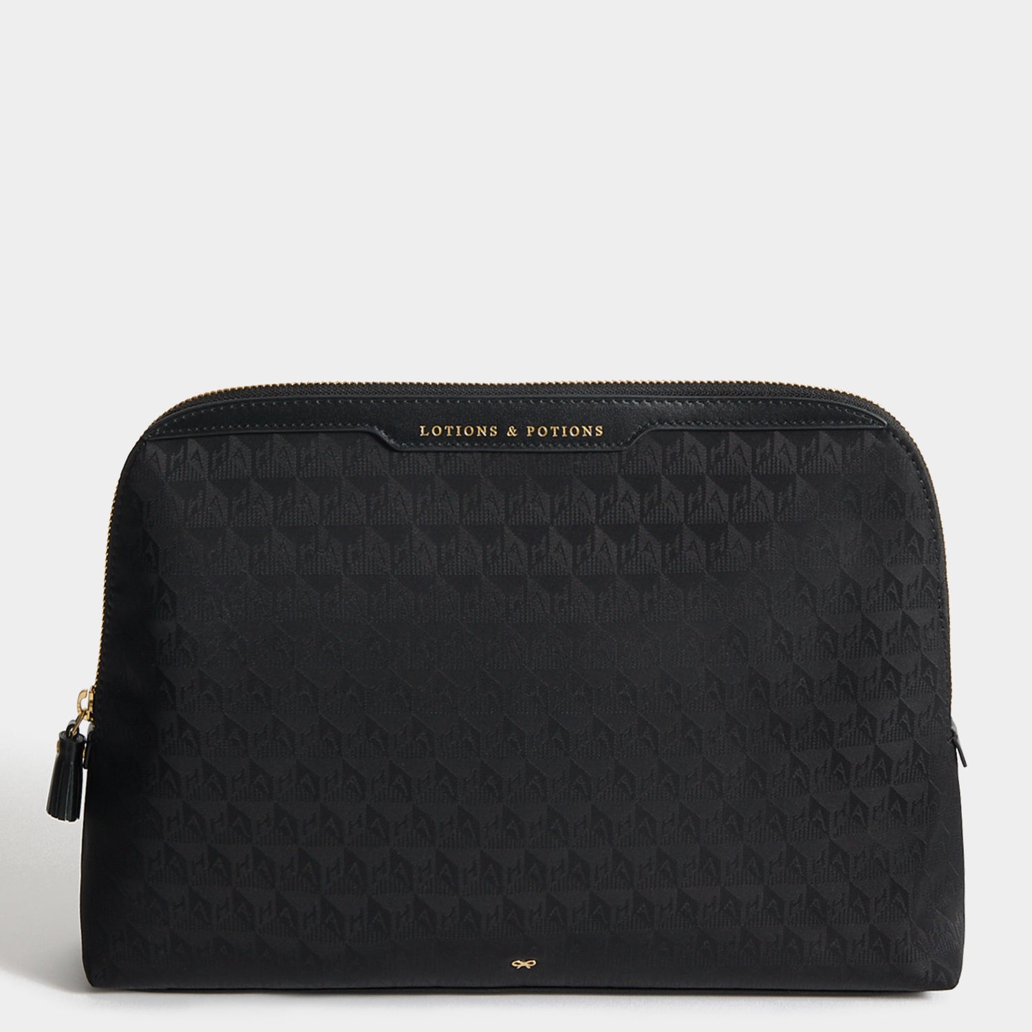 Logo Lotions and Potions Pouch -

          
            Recycled Nylon in Black -
          

          Anya Hindmarch US
