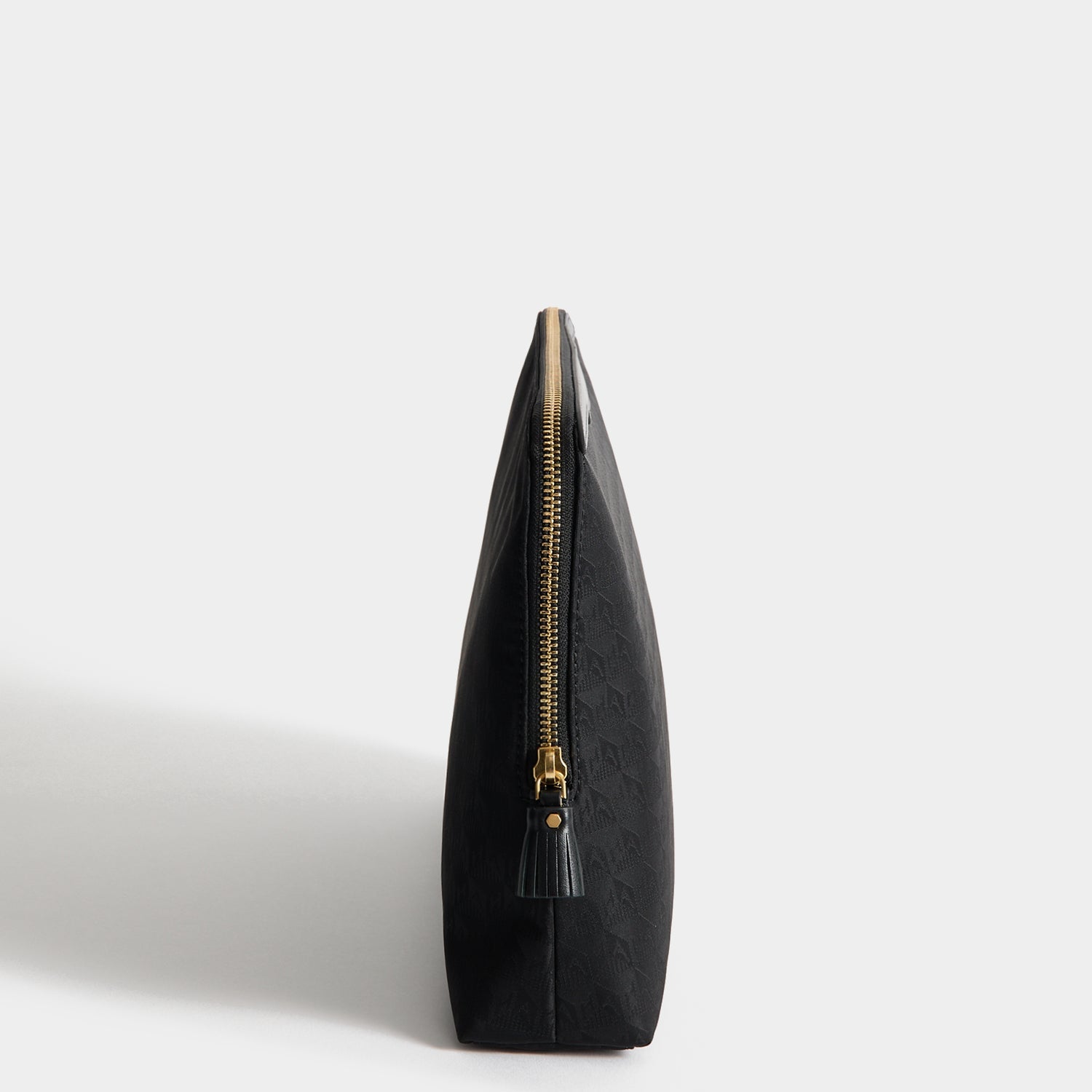 Logo Lotions and Potions Pouch -

          
            Recycled Nylon in Black -
          

          Anya Hindmarch US
