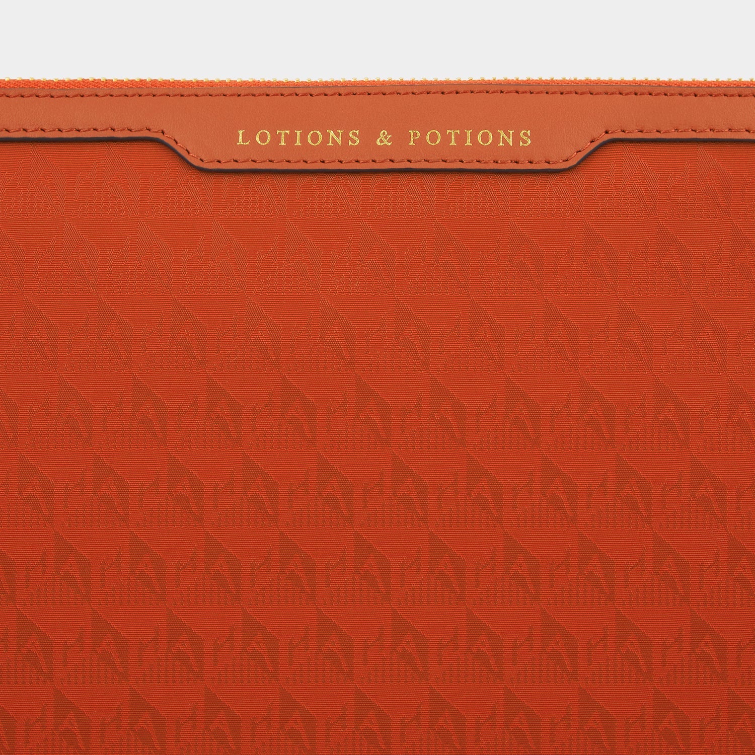 Logo Lotions and Potions Pouch -

                  
                    Jacquard Nylon in Burnt Sienna -
                  

                  Anya Hindmarch US

