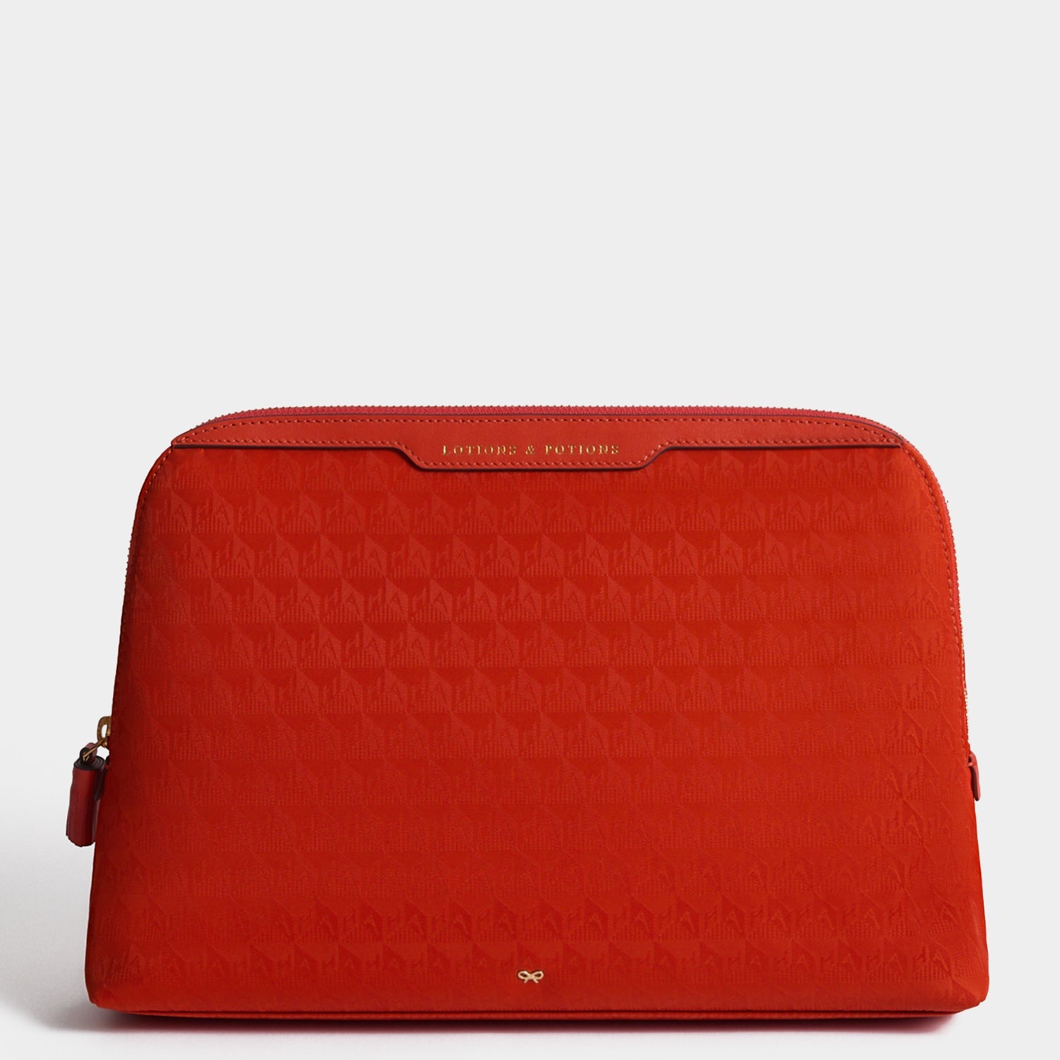 Logo Lotions and Potions Pouch -

          
            Jacquard Nylon Potions in Red -
          

          Anya Hindmarch US
