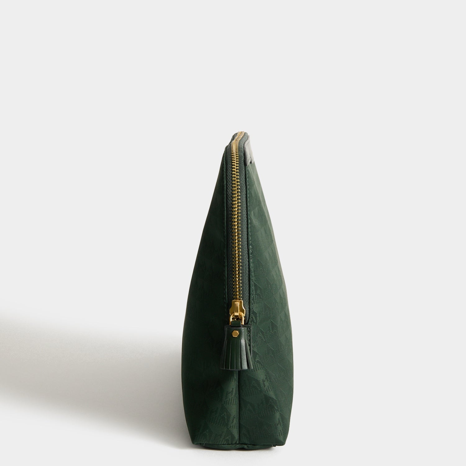 Logo Lotions and Potions Pouch -

          
            Jacquard Nylon in Dark Holly -
          

          Anya Hindmarch US
