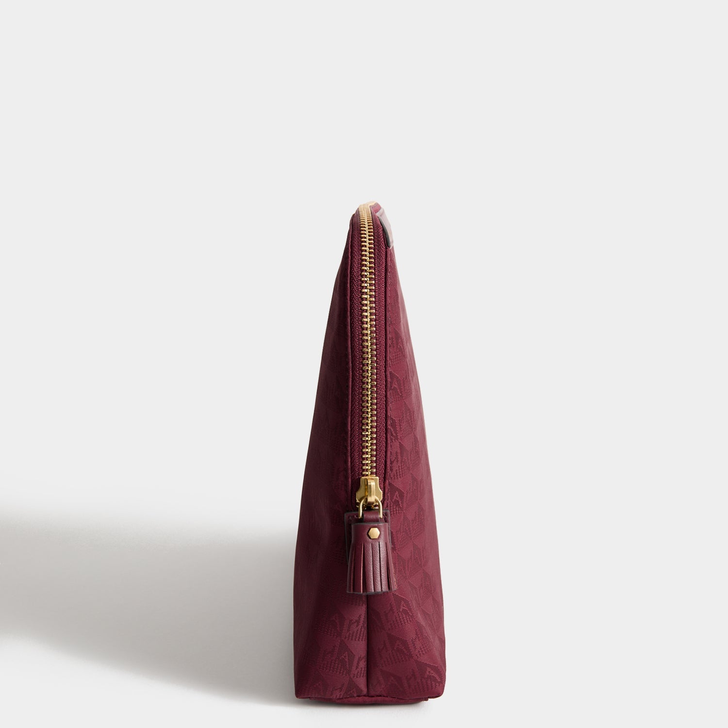 Logo Lotions and Potions Pouch -

          
            Jacquard Nylon in Medium Red -
          

          Anya Hindmarch US
