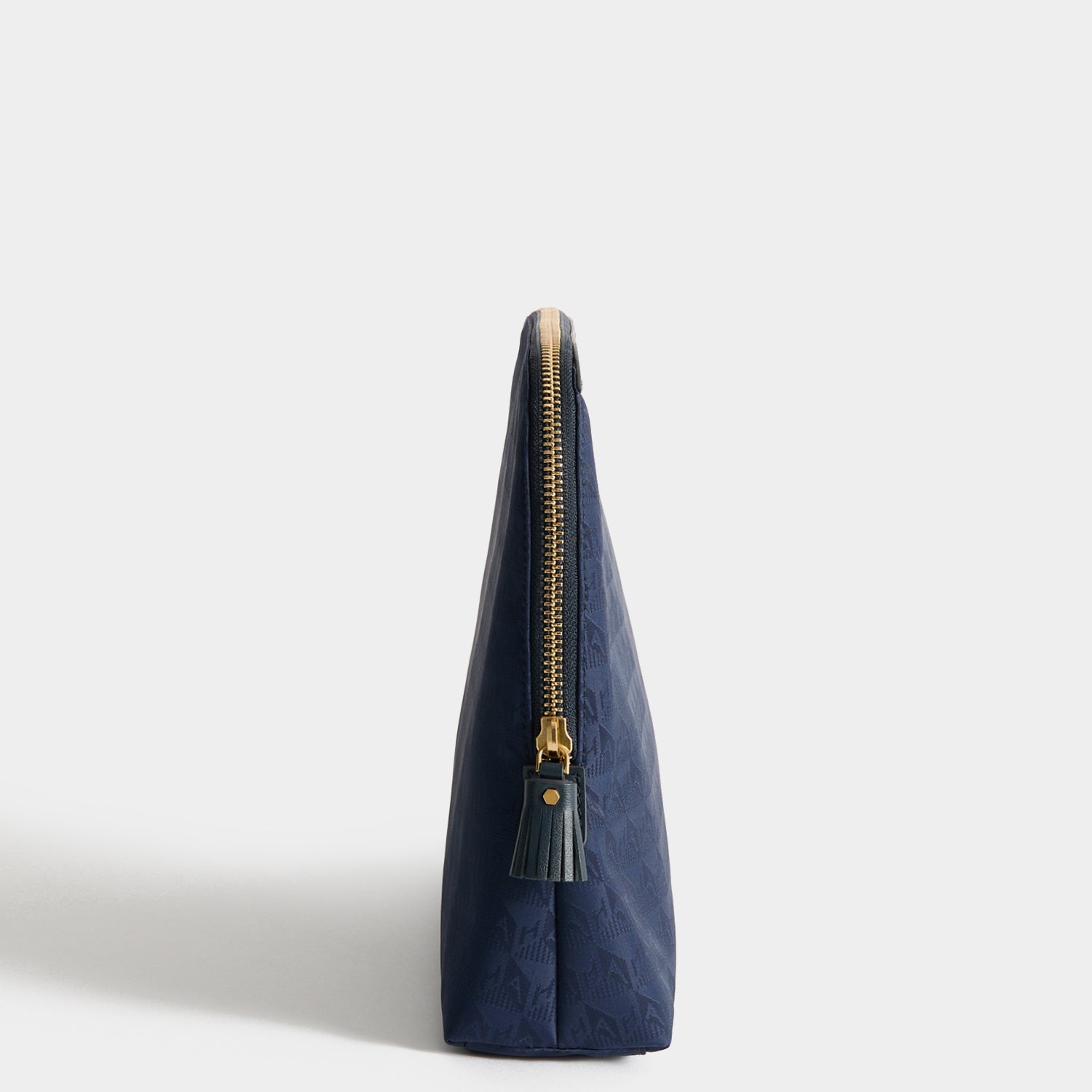 Logo Lotions and Potions Pouch -

          
            Jacquard Nylon in New Marine -
          

          Anya Hindmarch US
