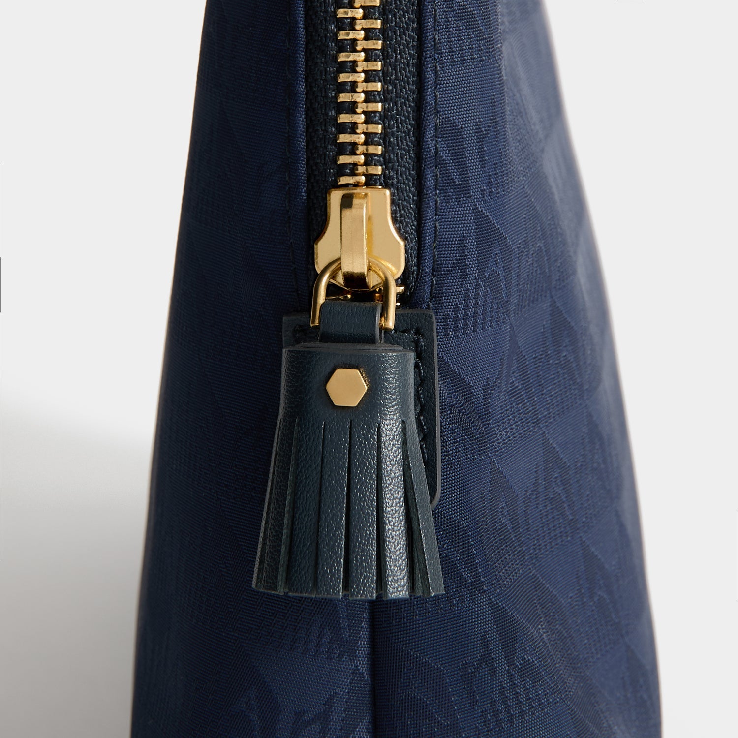 Logo Lotions and Potions Pouch -

          
            Jacquard Nylon in New Marine -
          

          Anya Hindmarch US
