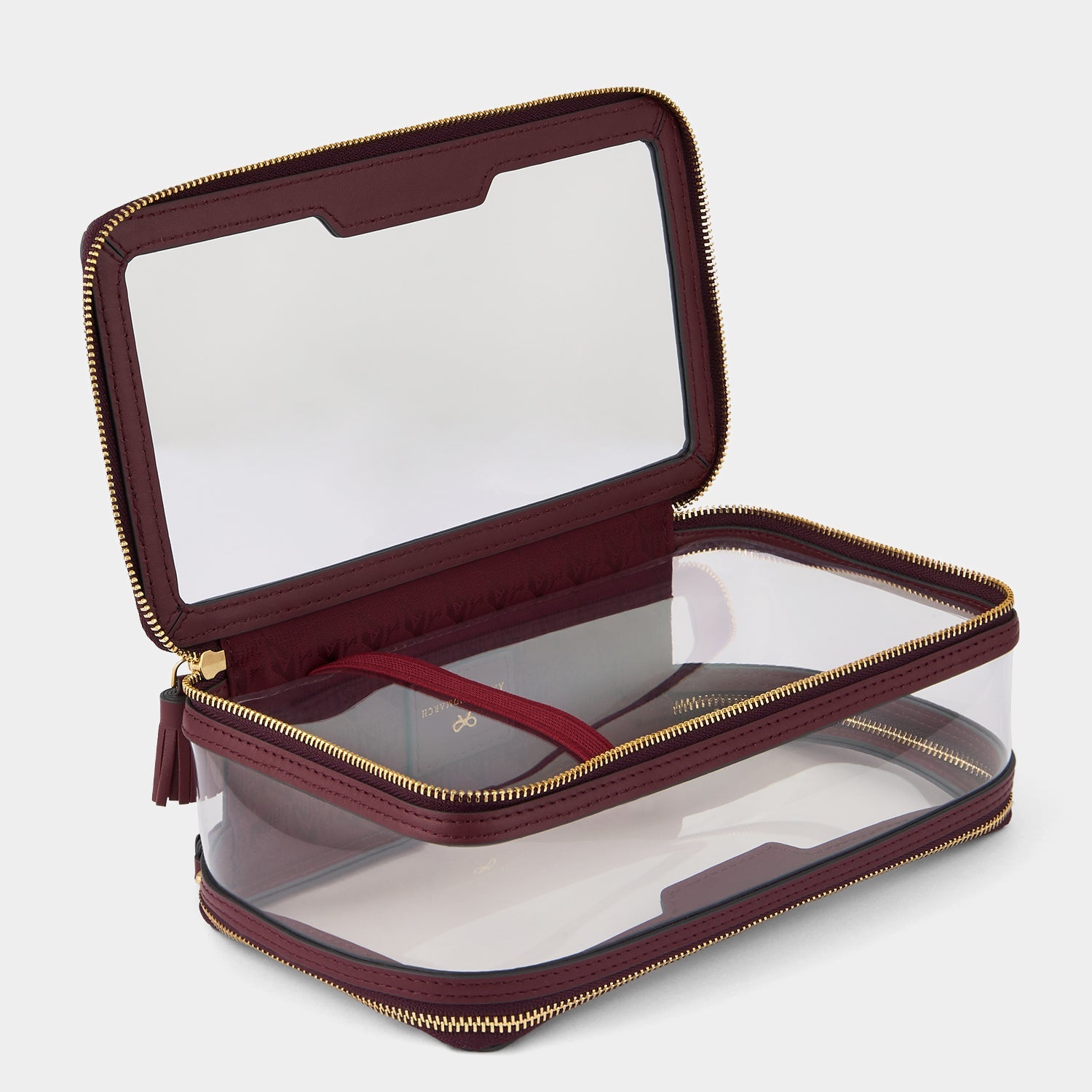 Logo In-Flight Case -

          
            Leather in Medium Red/TPU in Clear -
          

          Anya Hindmarch US
