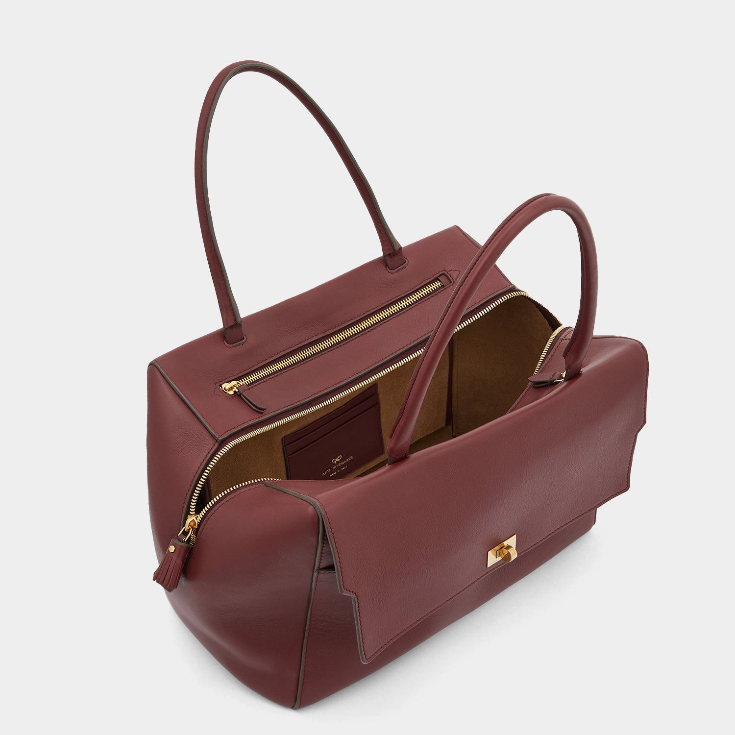 Seaton -

                  
                    Calf Leather in Rosewood -
                  

                  Anya Hindmarch US
