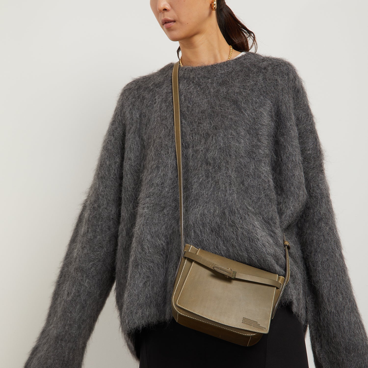Return to Nature Cross-body -

                  
                    Compostable Leather in Fern -
                  

                  Anya Hindmarch US
