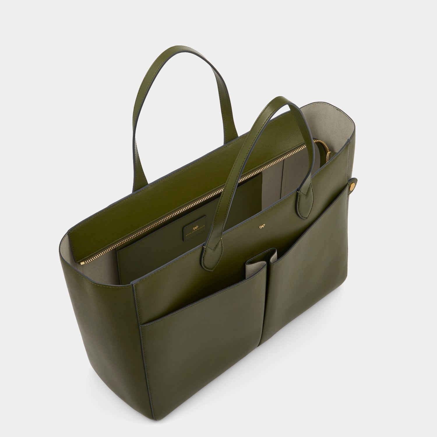 E/W Nevis Tote -

          
            Smooth Leather in Olive -
          

          Anya Hindmarch US
