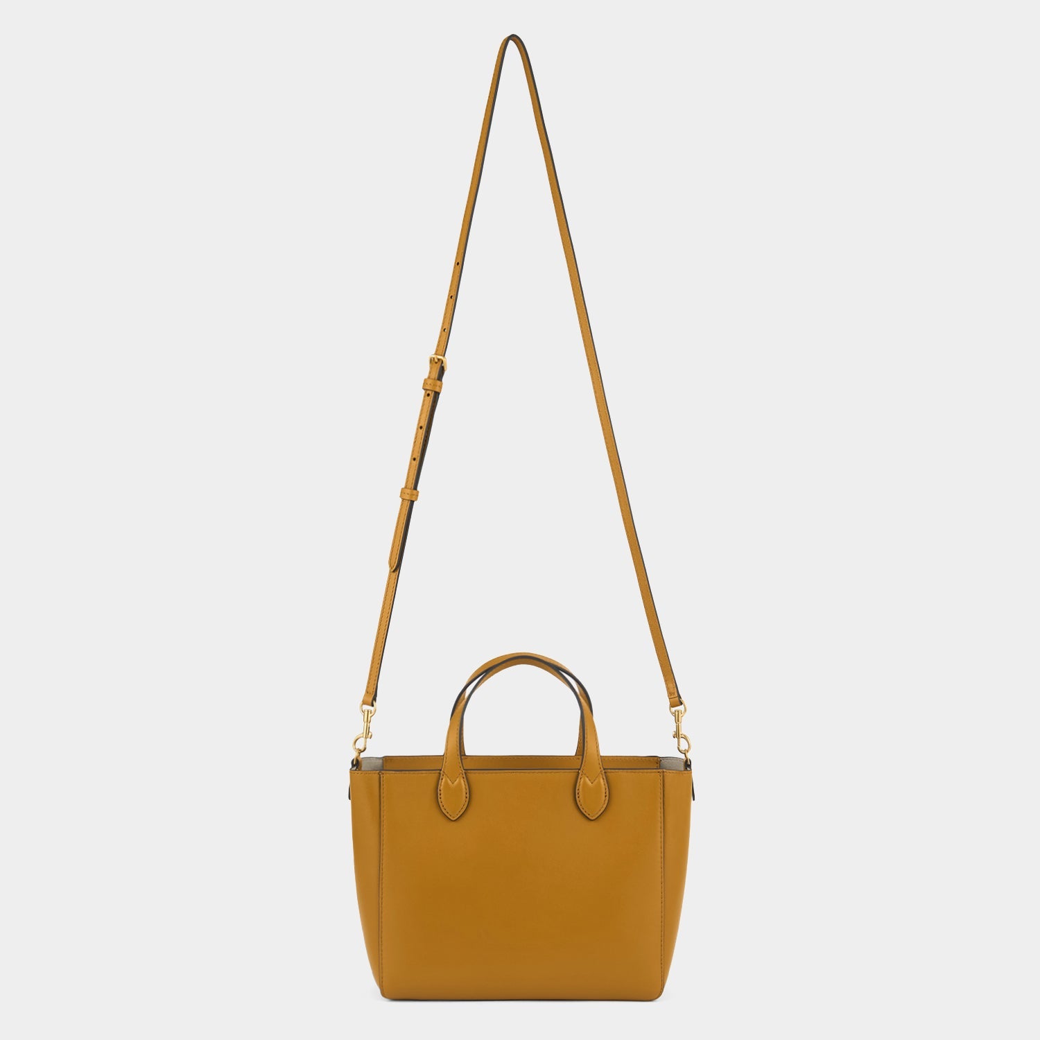 Nevis XS Tote -

          
            Smooth Leather in Tumeric -
          

          Anya Hindmarch US
