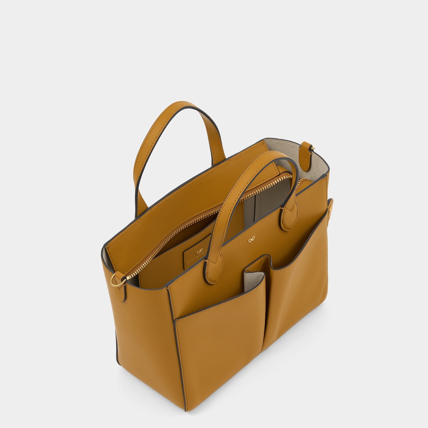 Nevis XS Tote -

          
            Smooth Leather in Tumeric -
          

          Anya Hindmarch US
