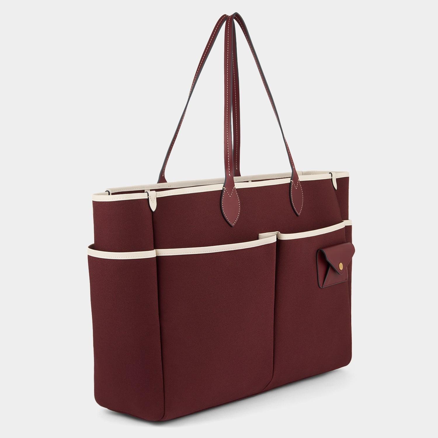 E/W Canvas Tote -

          
            Smooth Leather in Medium Red -
          

          Anya Hindmarch US
