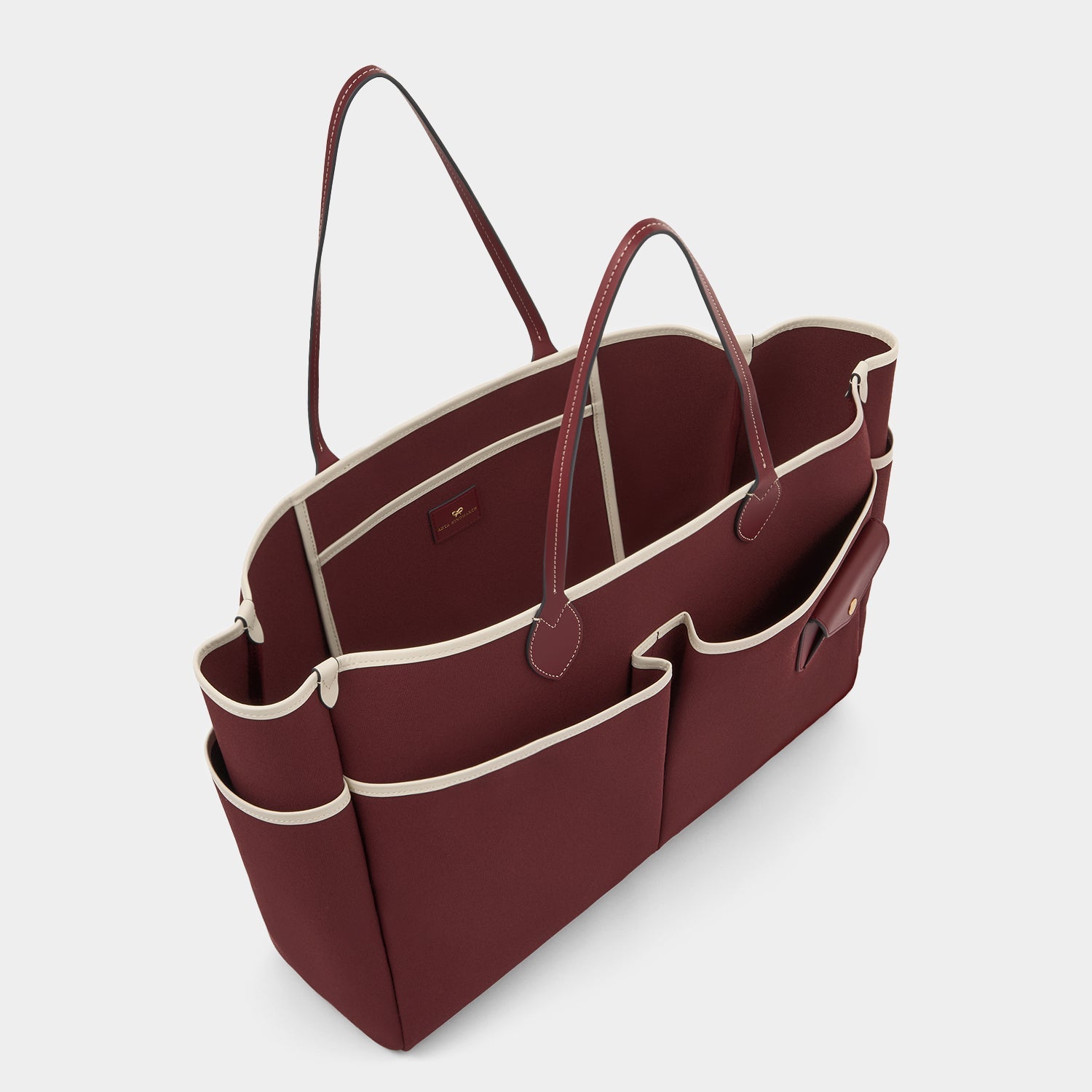 E/W Canvas Tote -

          
            Smooth Leather in Medium Red -
          

          Anya Hindmarch US
