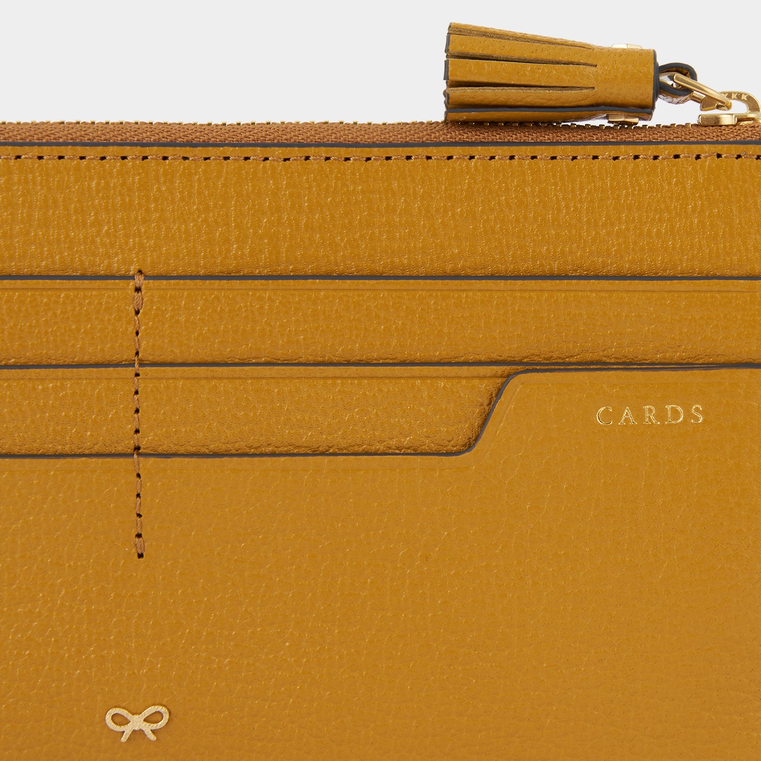 Envelope Slim Zip Wallet -

                  
                    Capra Leather in Tumeric -
                  

                  Anya Hindmarch US
